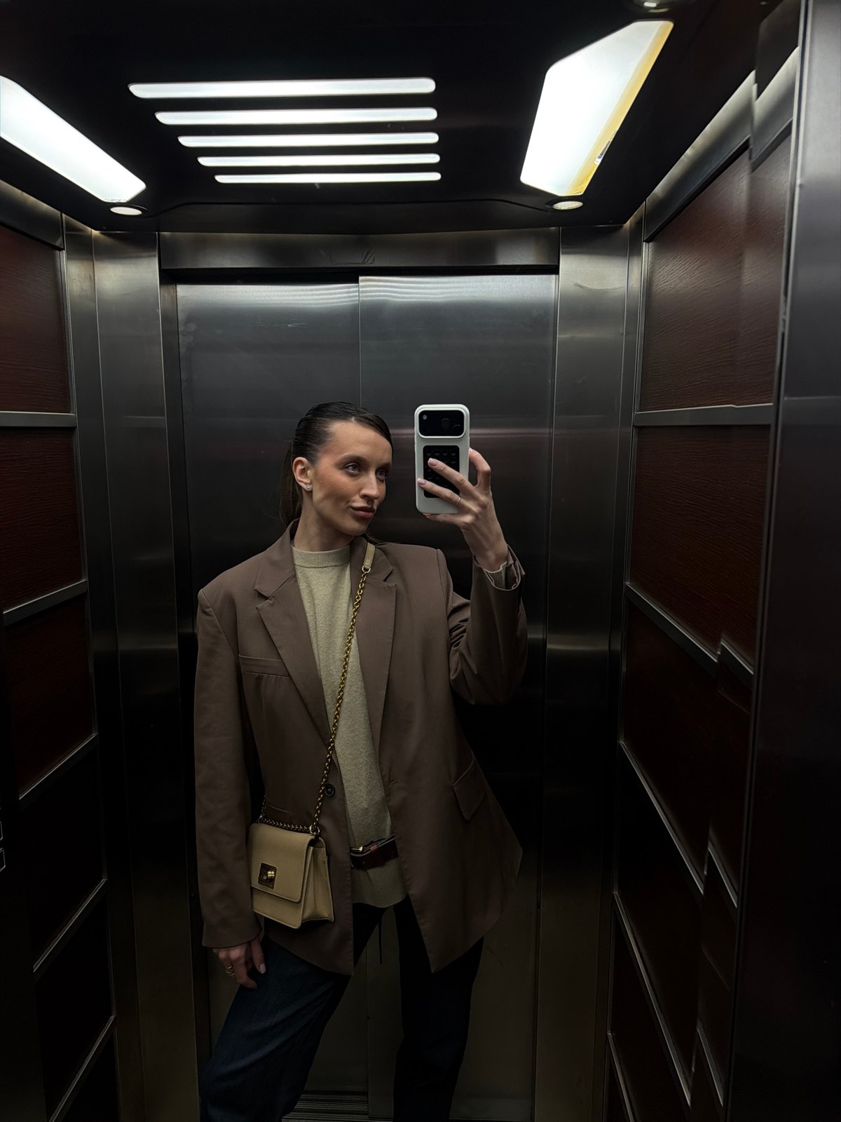 Woman takes elevator selfie in Budva, Montenegro