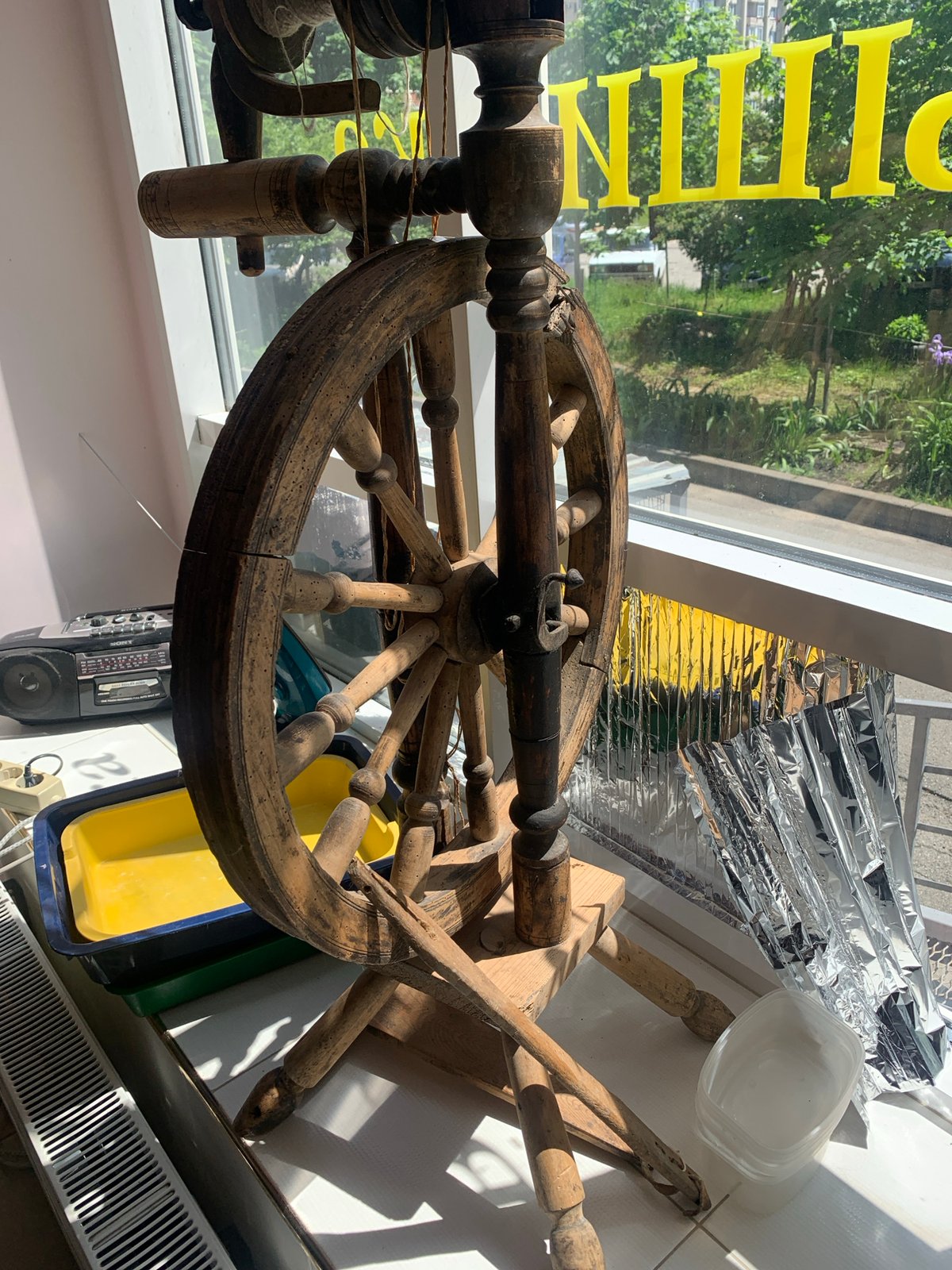 Antique spinning wheel spotted indoors in Stavropol, Russia