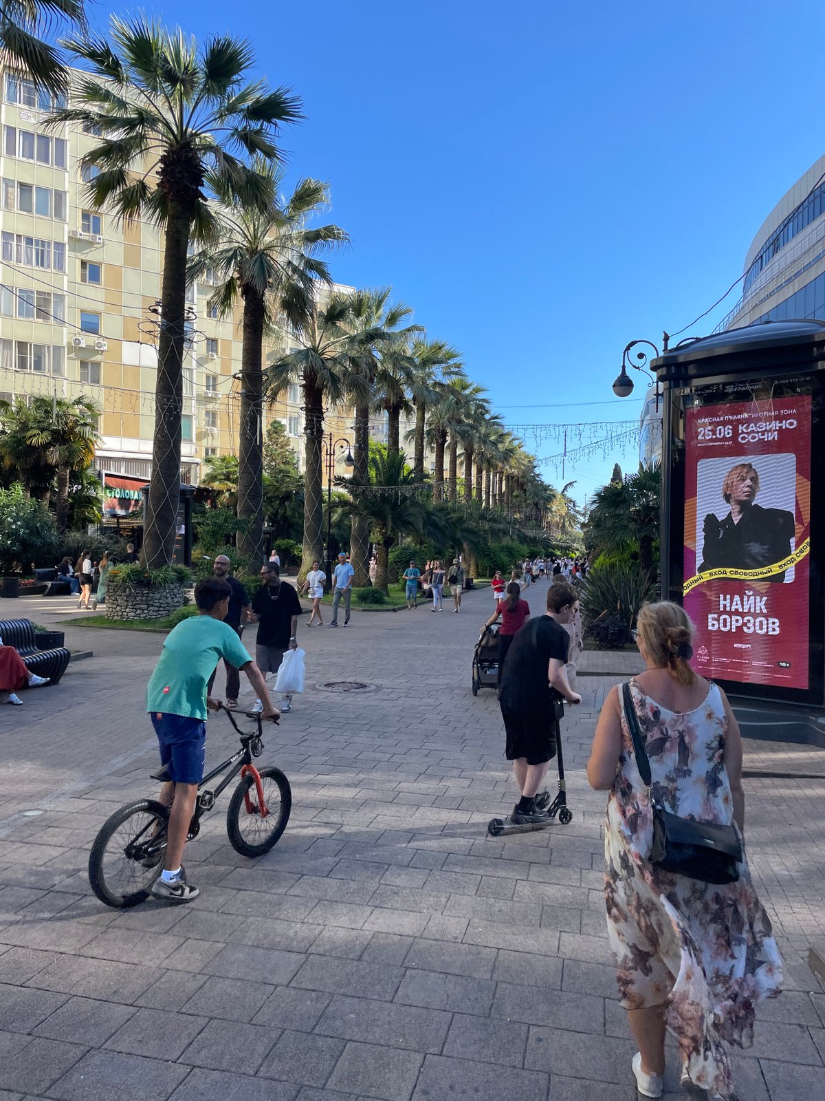 Sunny afternoon stroll through Sochi's promenade, gardens, and souvenir stalls