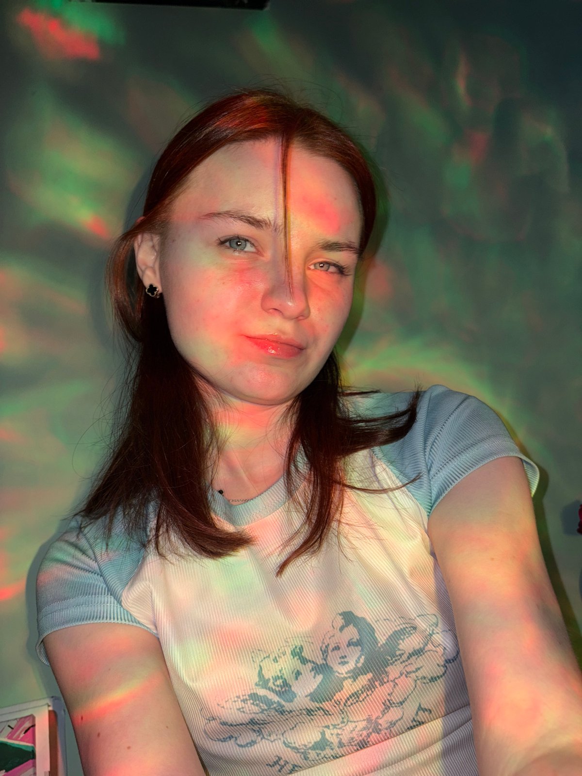 Portrait photos of two women captured indoors in Russia