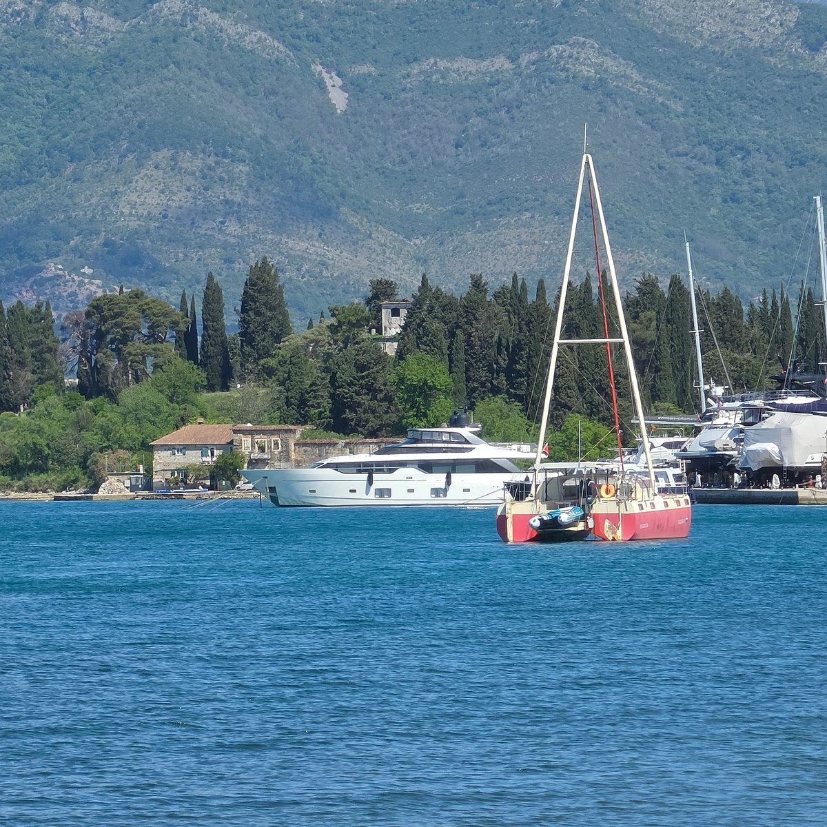 Morning marina activity captured in Mrčevac, Montenegro coastal waters