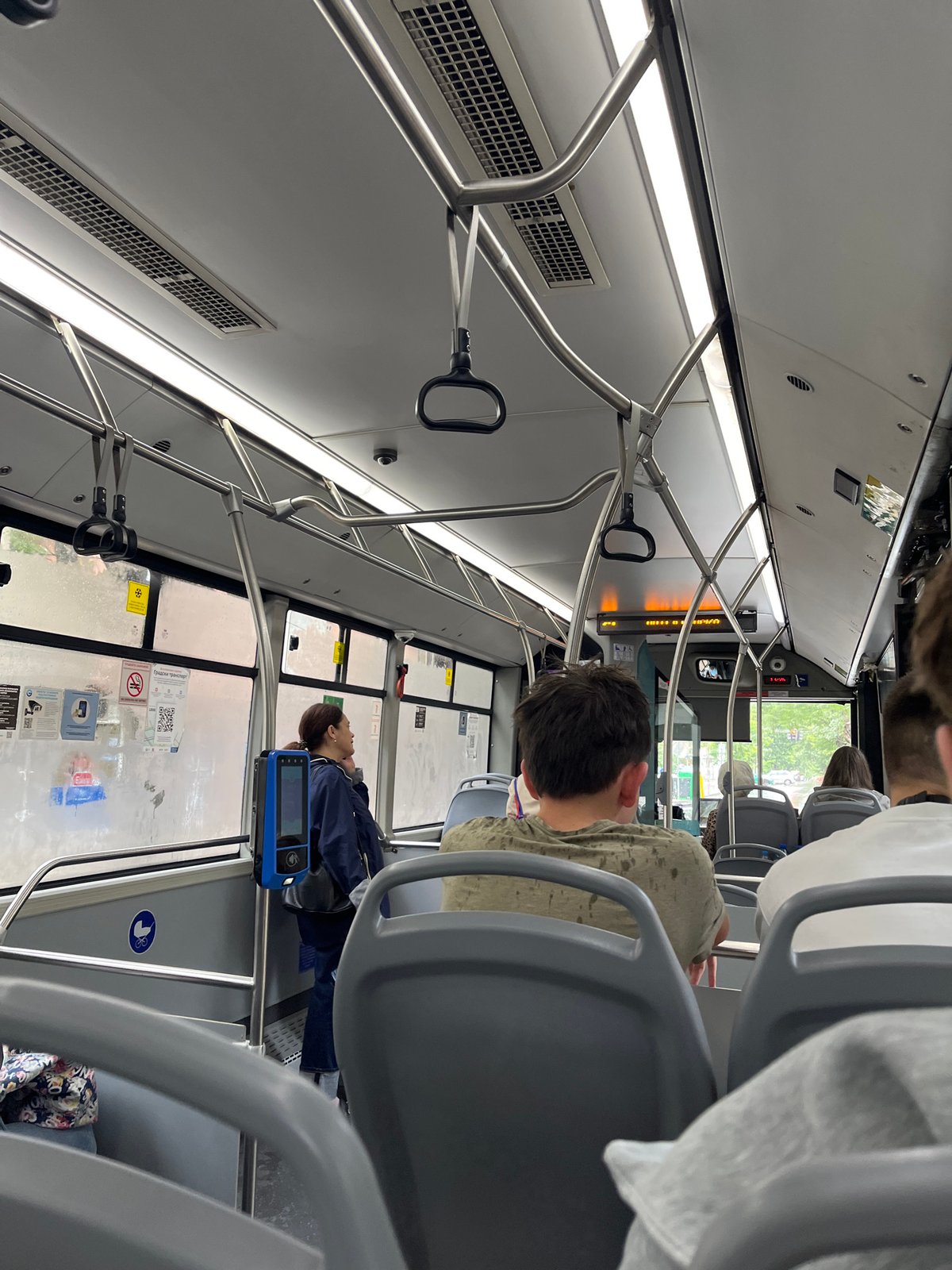 Passenger documents modern bus interior in Sofia