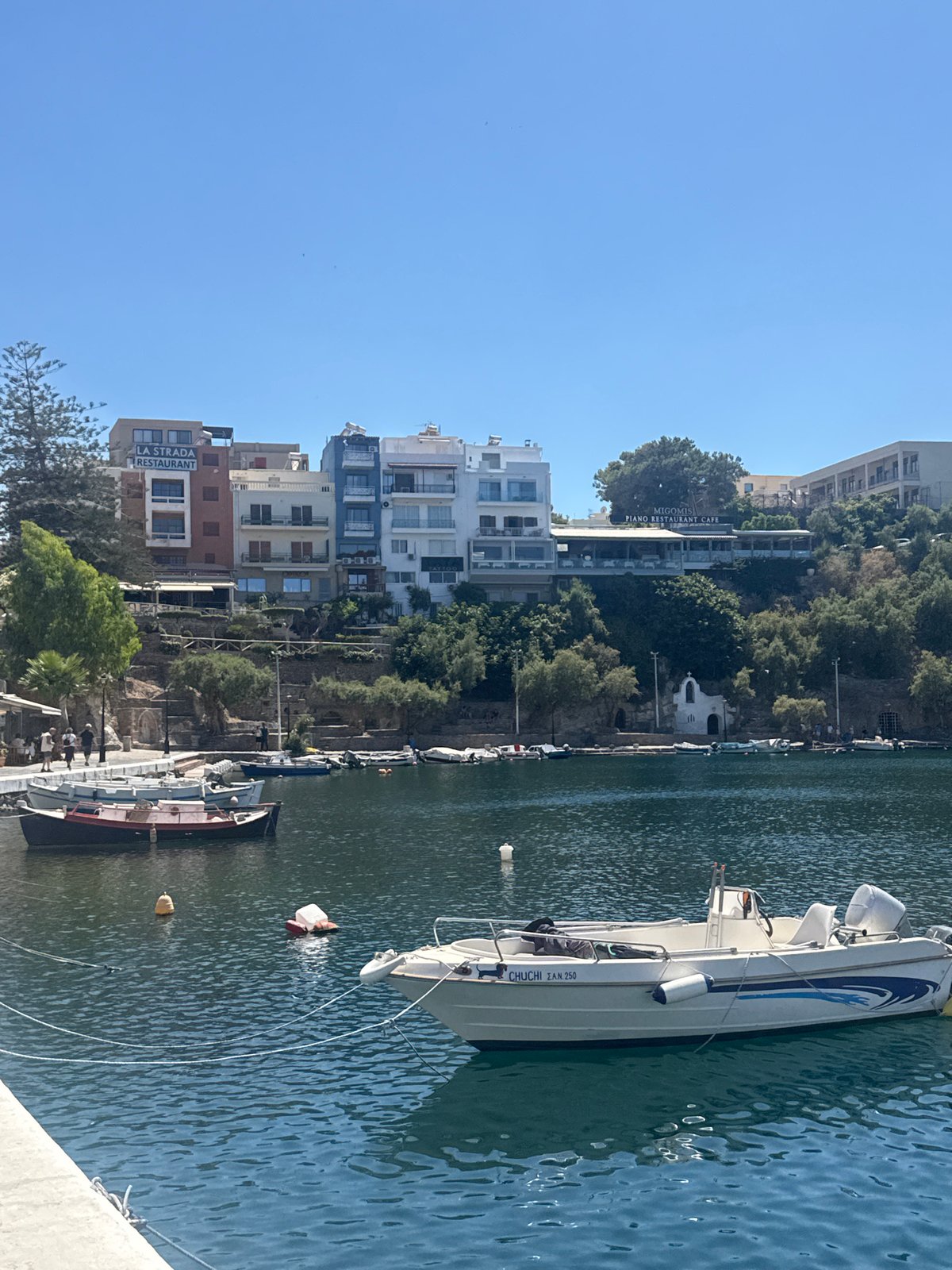 Exploring Agios Nikolaos harbor and town on a sunny afternoon