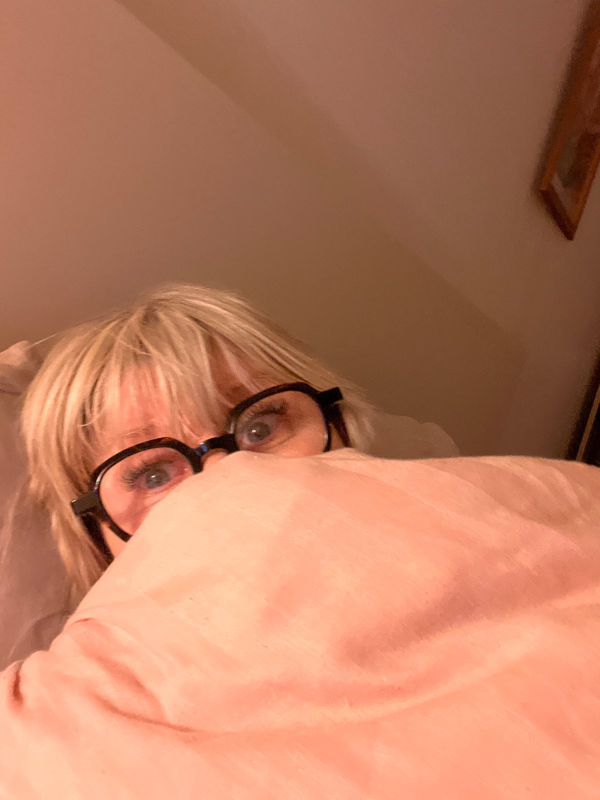 Woman takes bedroom selfies in Chambœuf, France