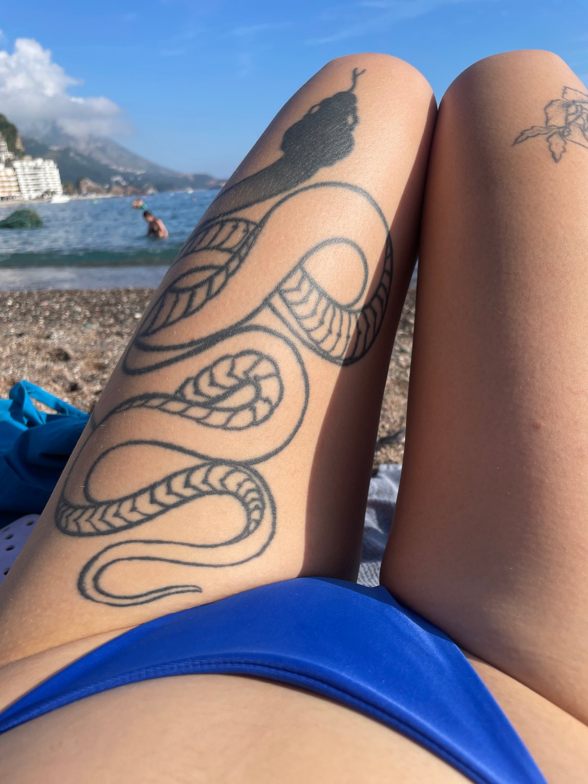 Woman sunbathing captured on Rafailovići beach, Montenegro