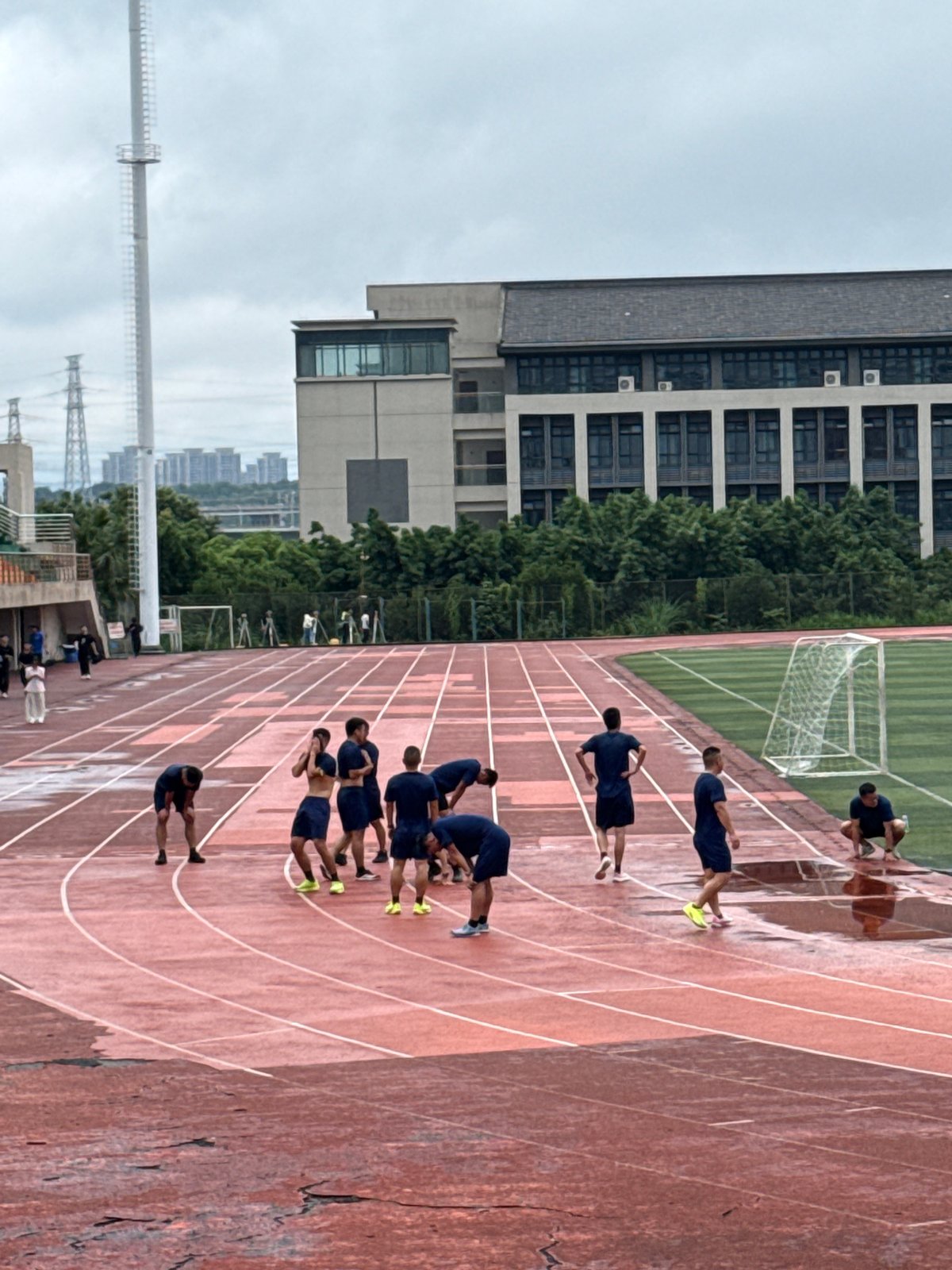 Surveying and track training underway at Jiangjin District Stadium