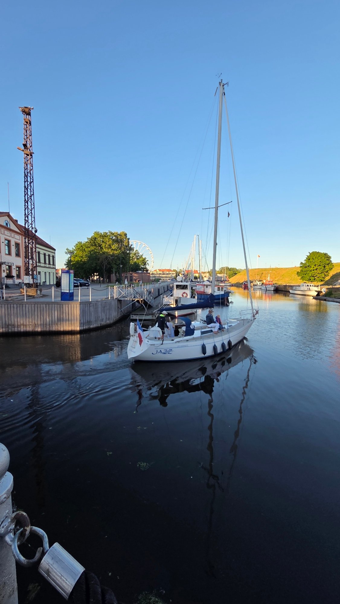 Klaipėda waterfront: marina, drawbridge, and street sculpture