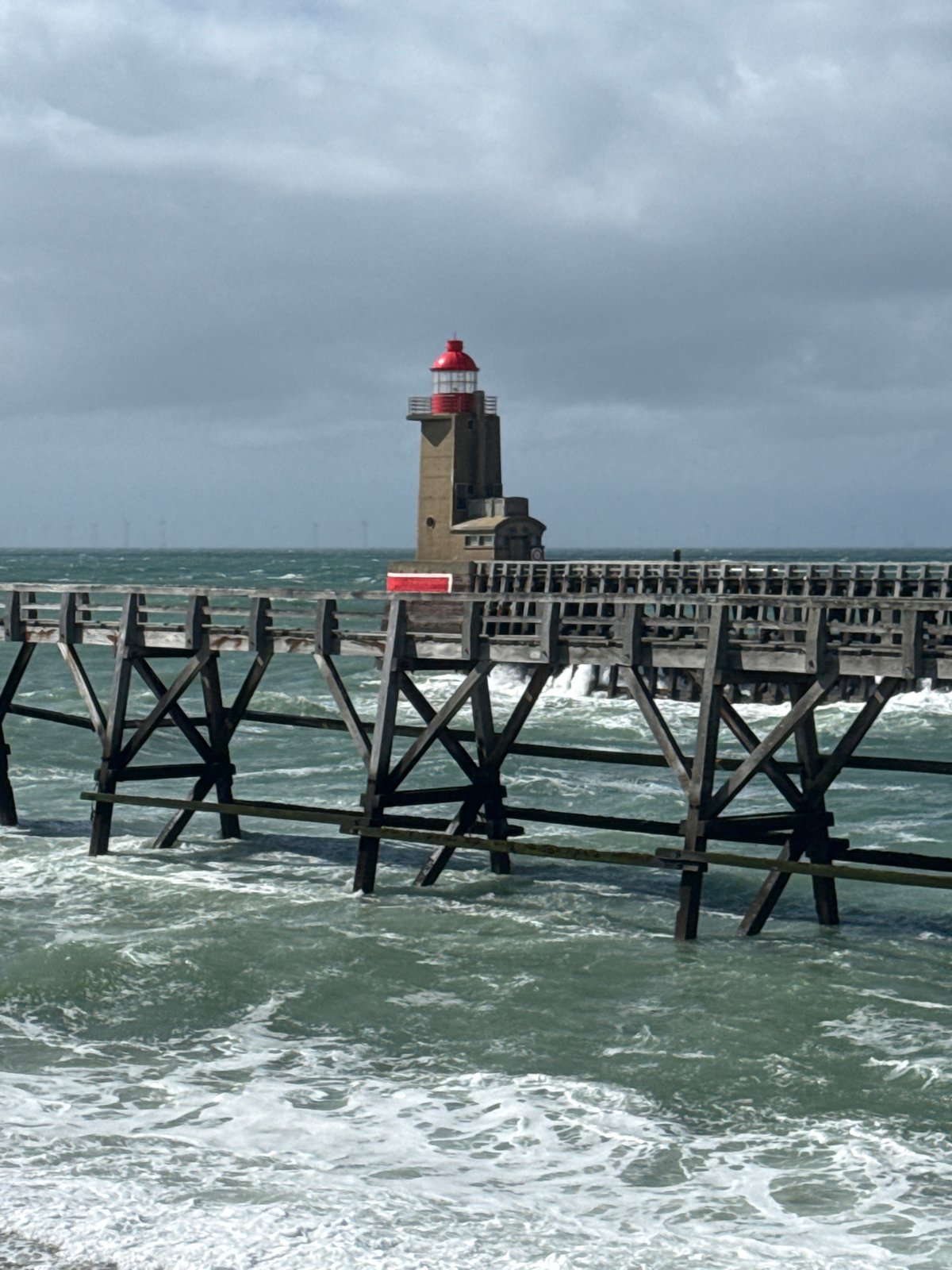 Rough seas and overcast skies documented at Fécamp coast