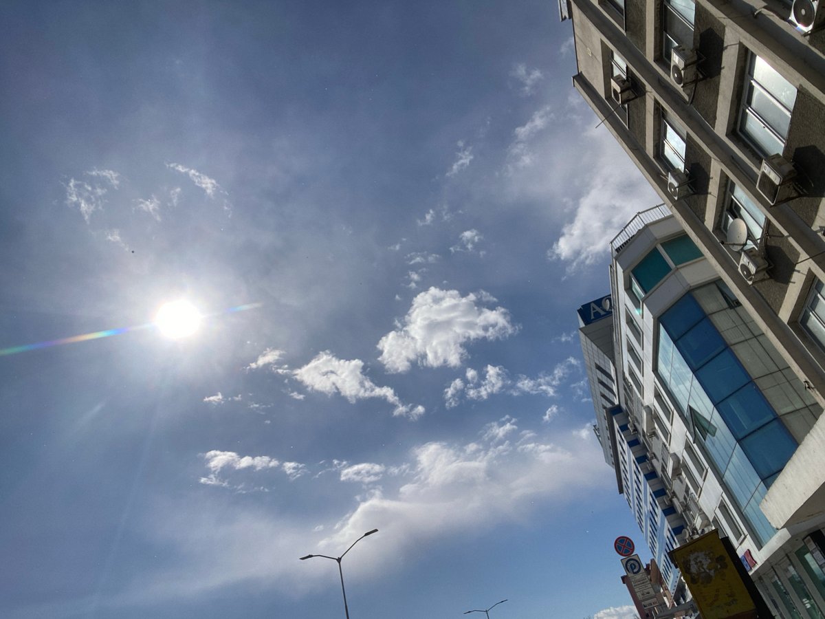 Clear skies, tall buildings documented in Varna street scene