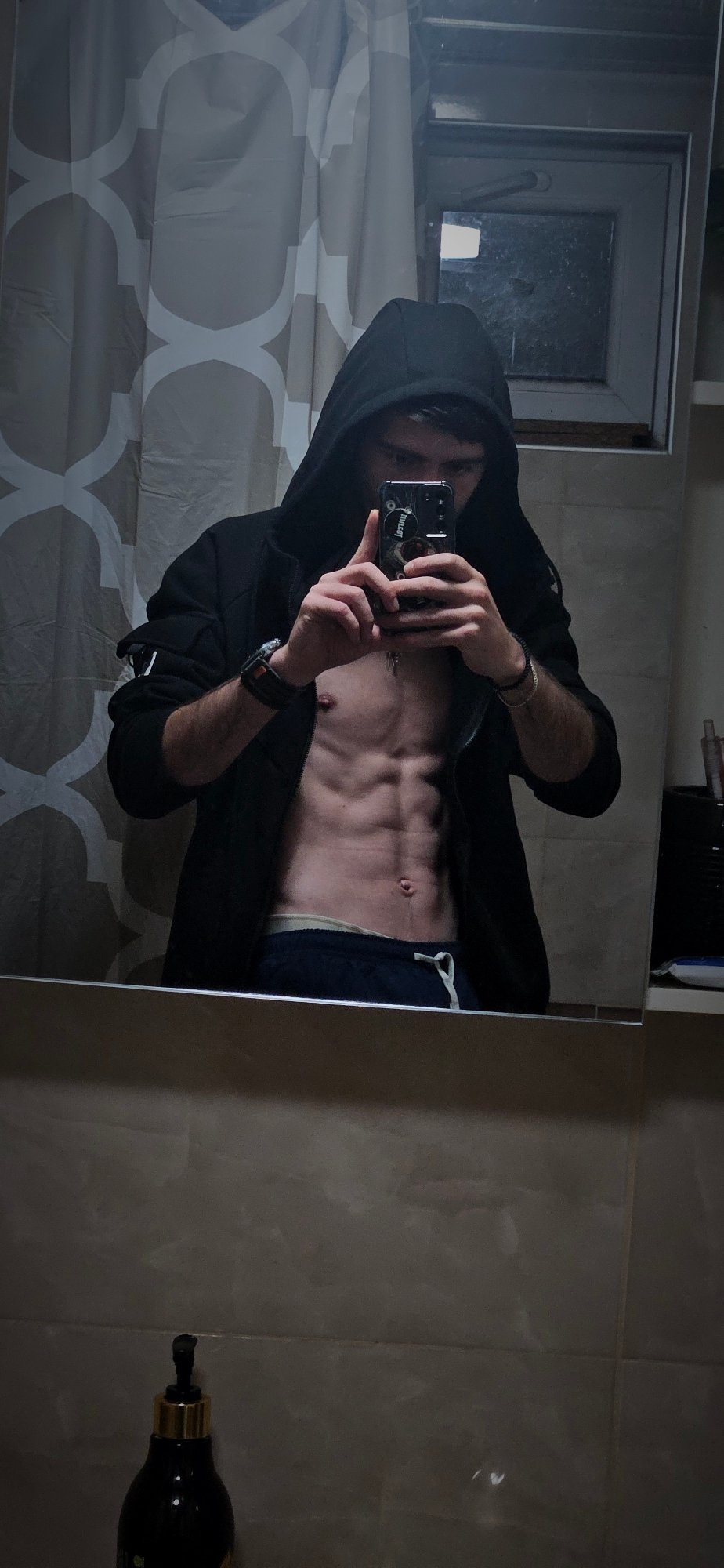 Person takes series of mirror selfies in Kostenets home