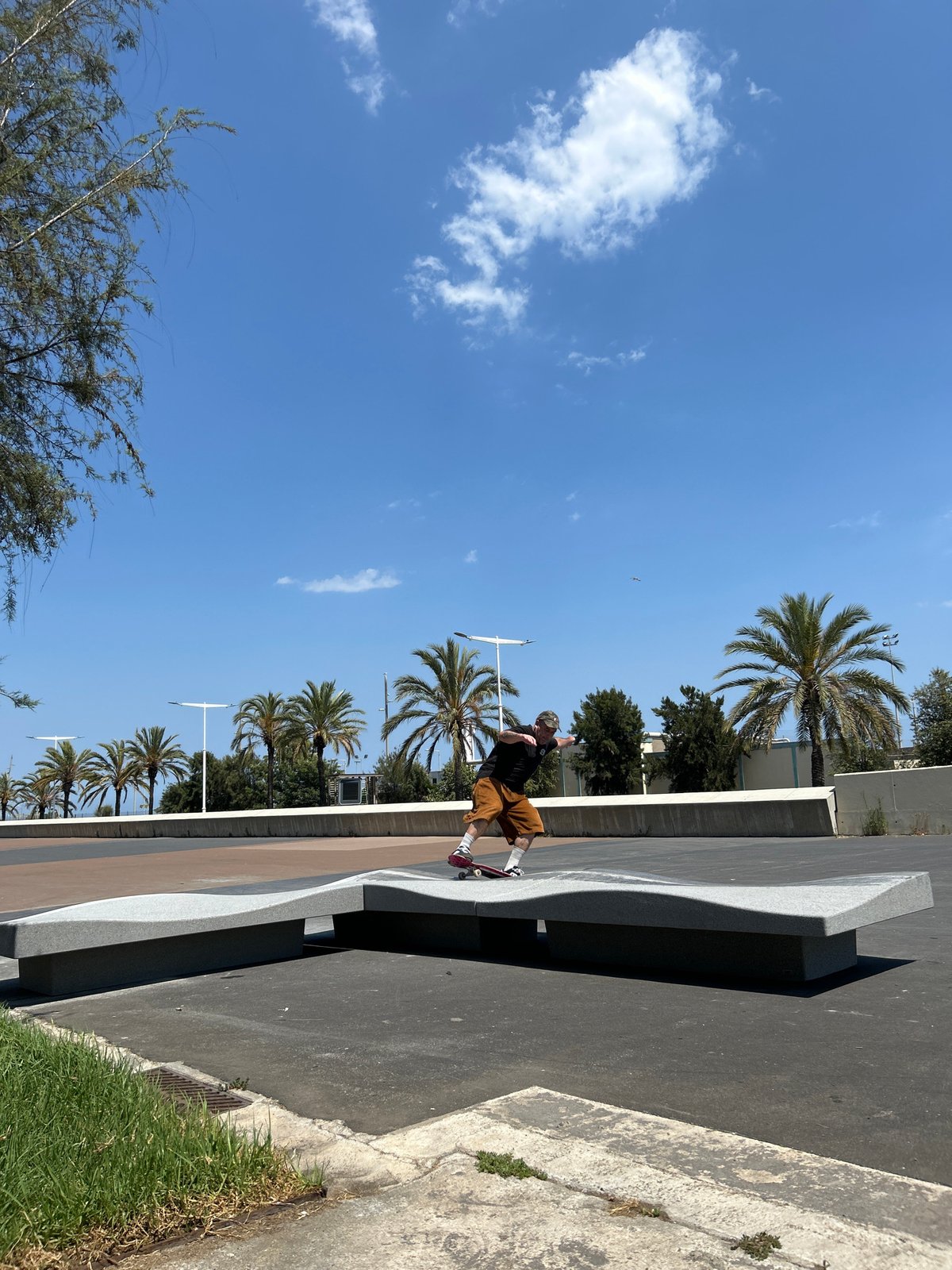 Skating and cycling in sunny Barcelona on a summer afternoon