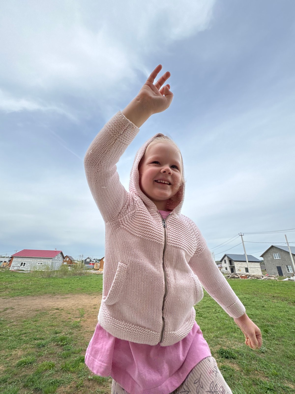 Family playtime captured in Russian village yard