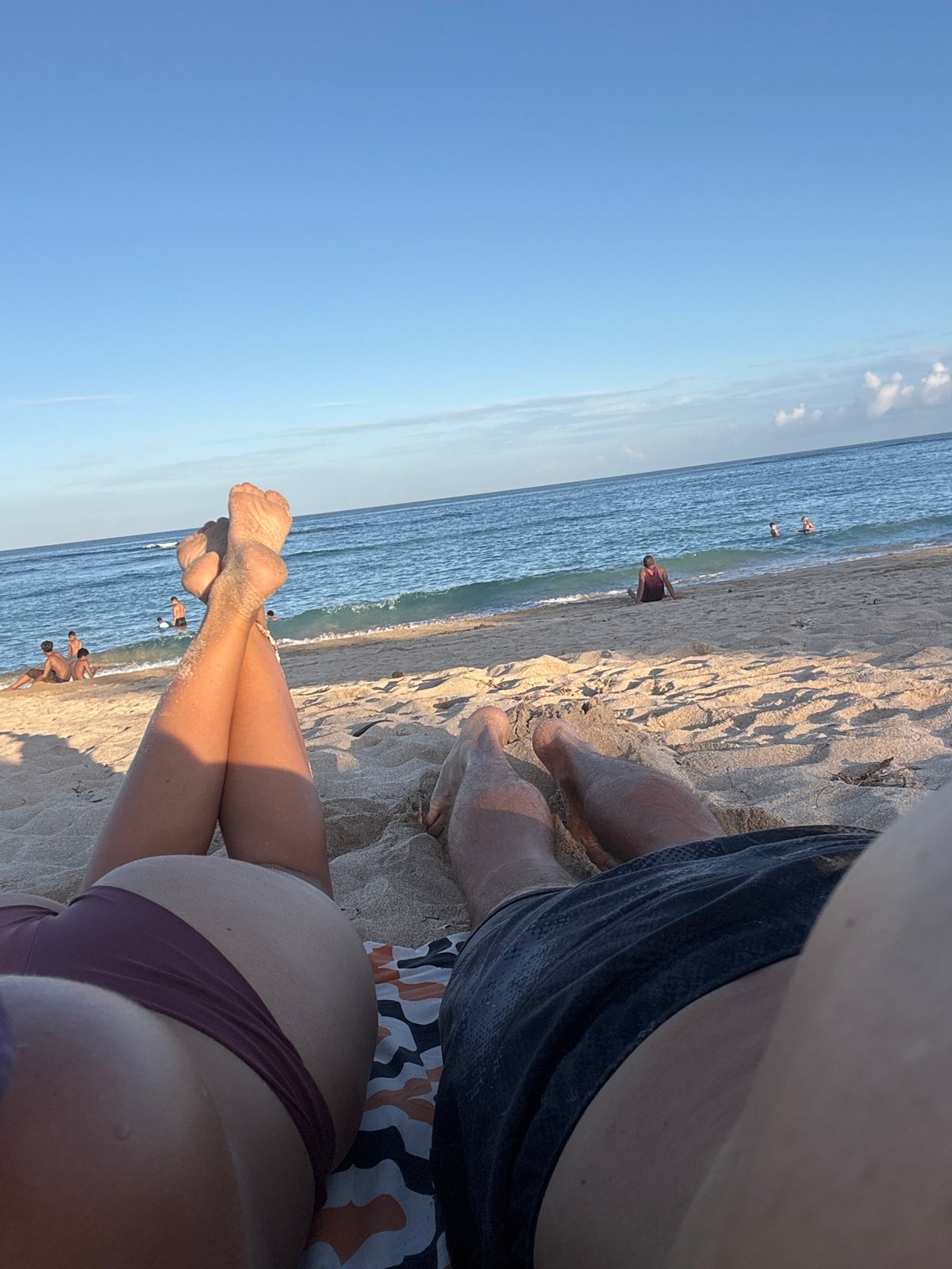 Morning beach activities unfold at Kuta Selatan, Indonesia