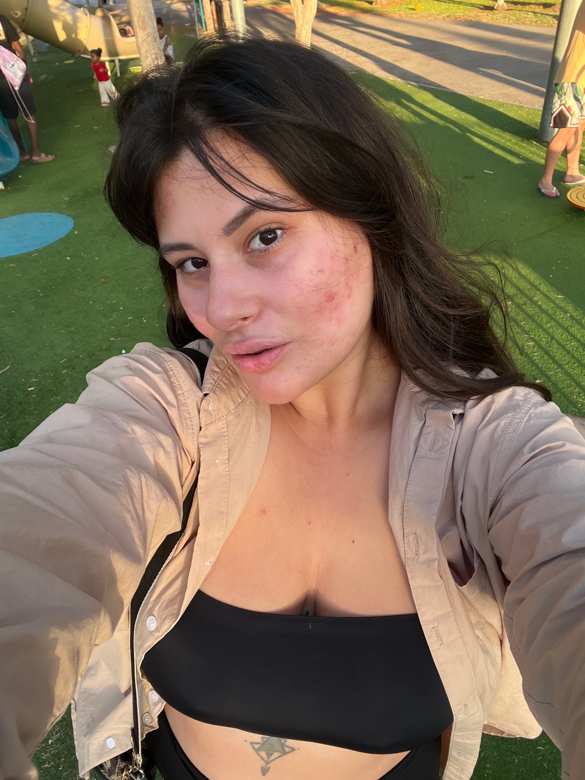 Sunny afternoon at a Kiryat Bialik park, selfies and all.