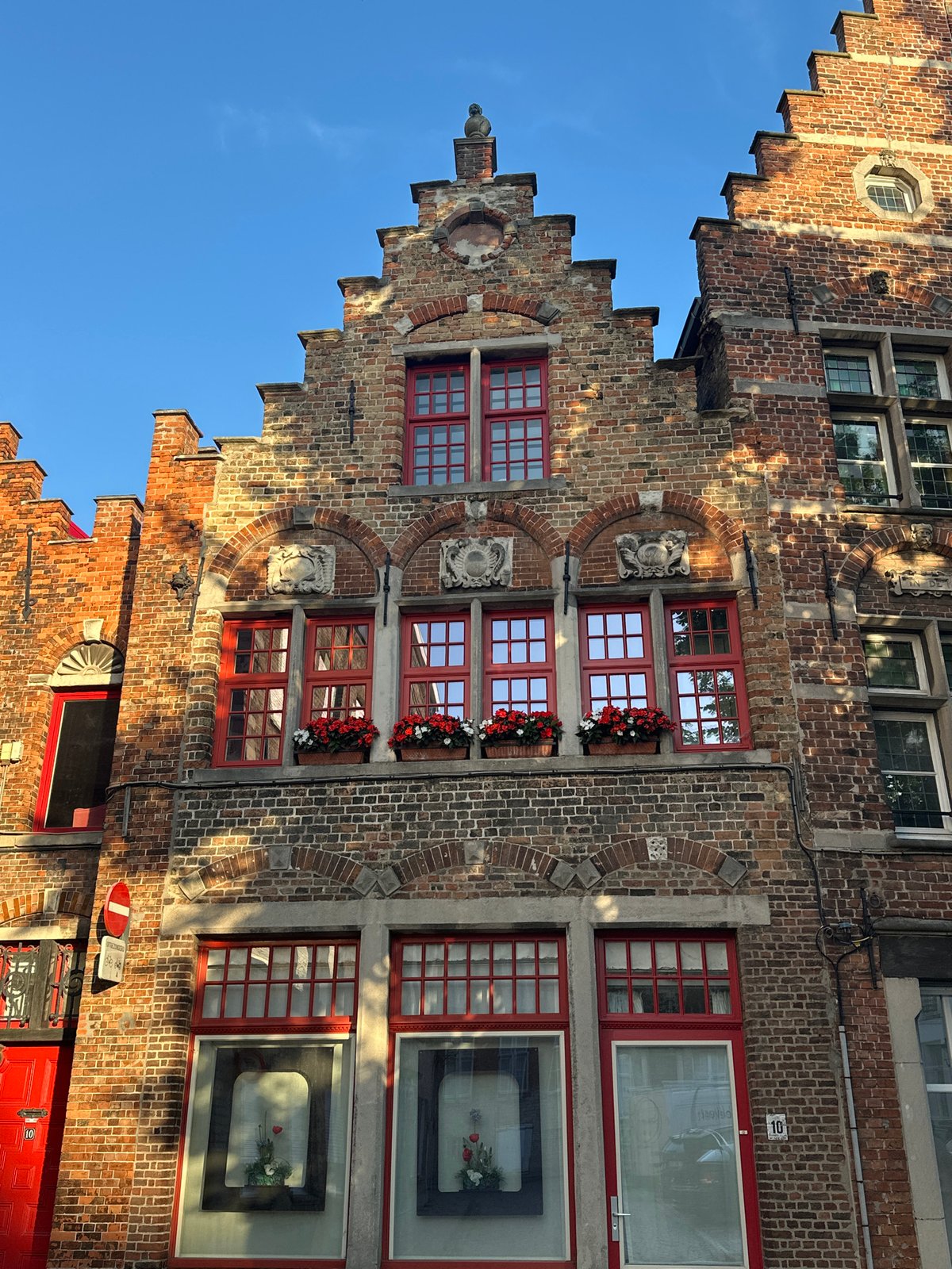 Historic streets and squares of Bruges on a clear evening