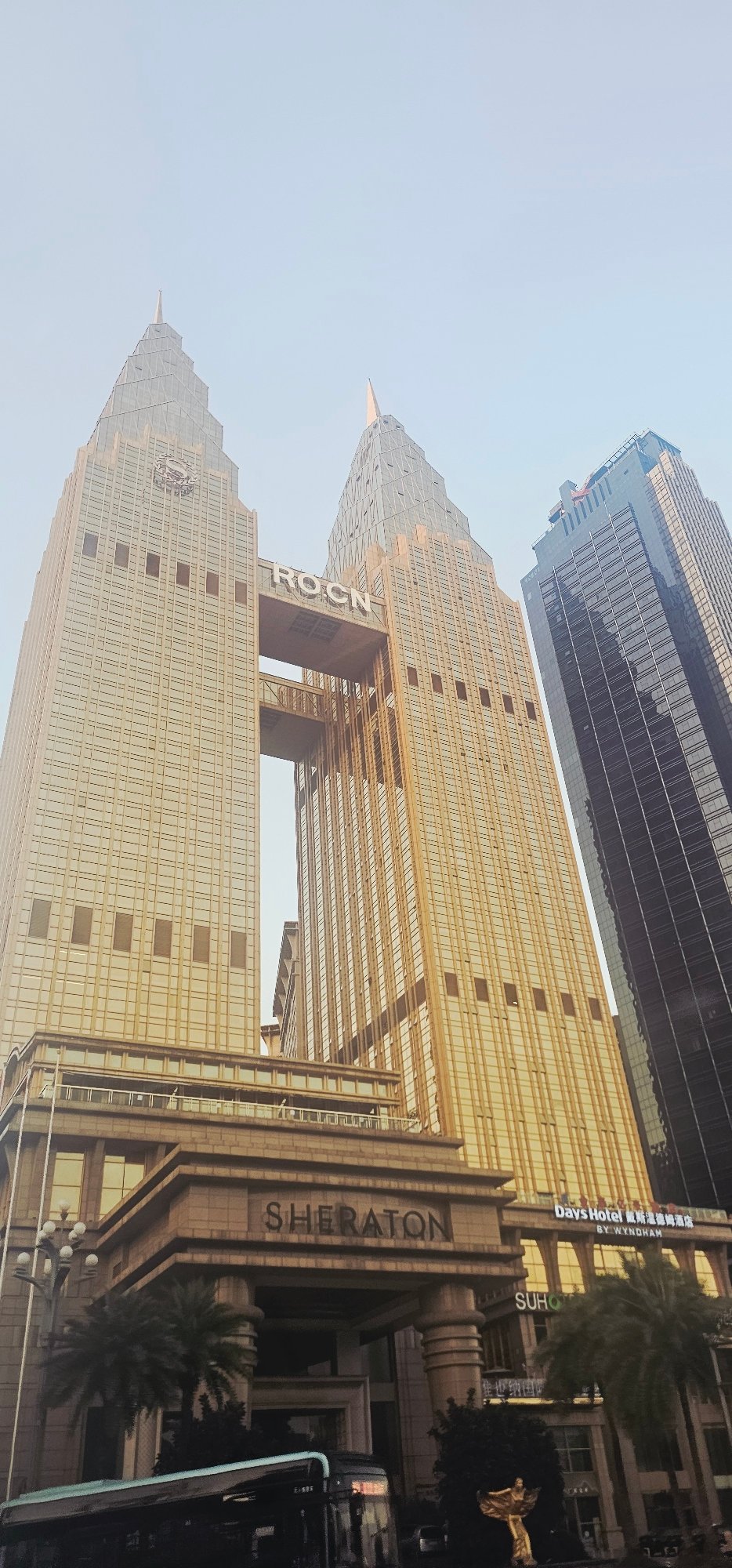 Chongqing's golden Sheraton tower from three street-level angles