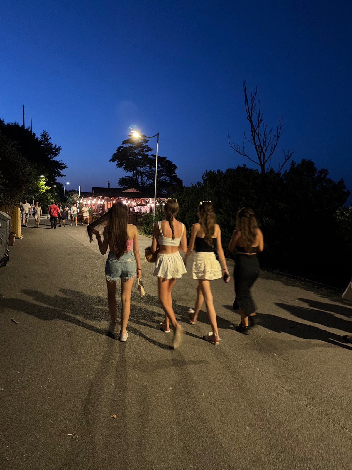 A summer night along the Burgas beachfront bar strip.
