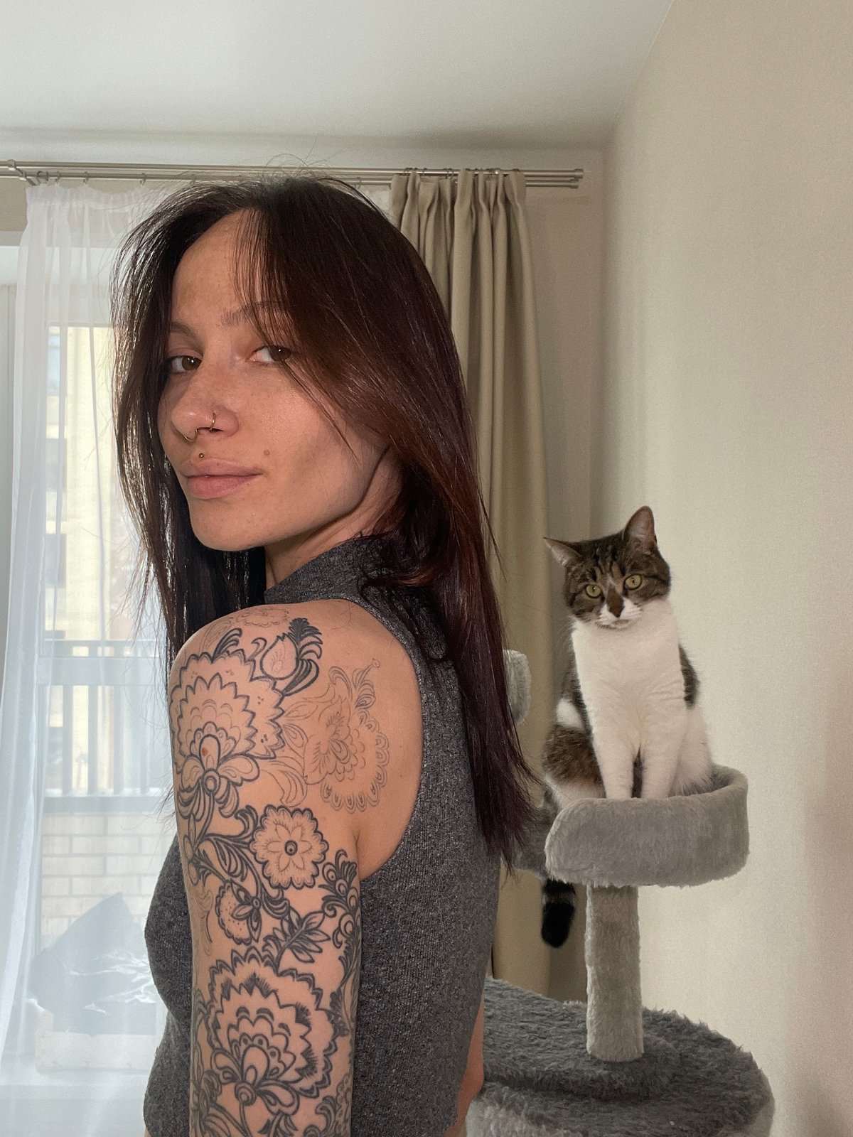 Woman takes mirror selfie in Izhevsk bathroom