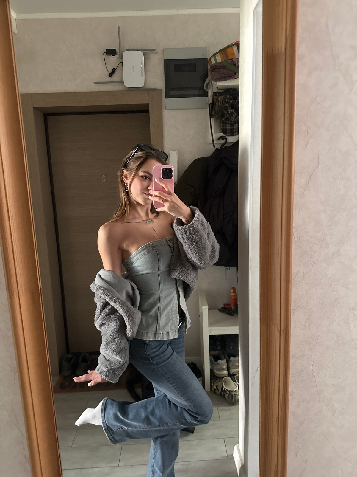 Mirror selfie session in a Moscow apartment, ready to head out