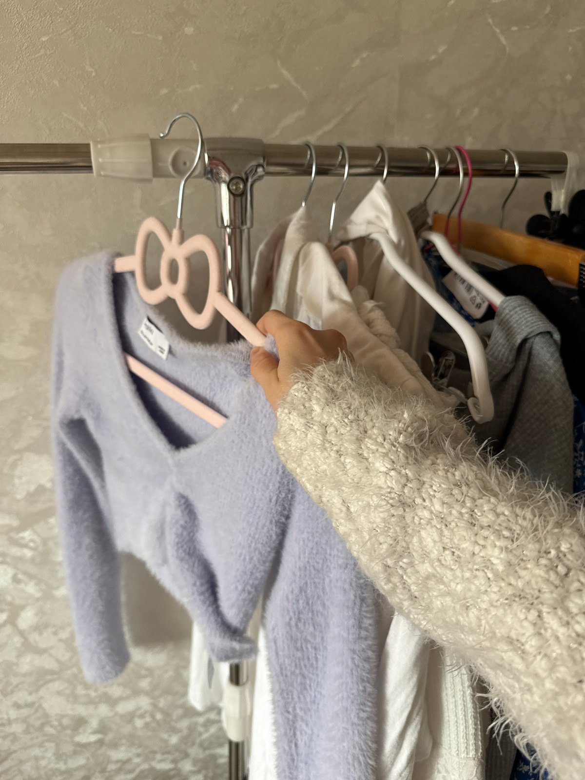 GRWM outfit selection with wrist check title cards