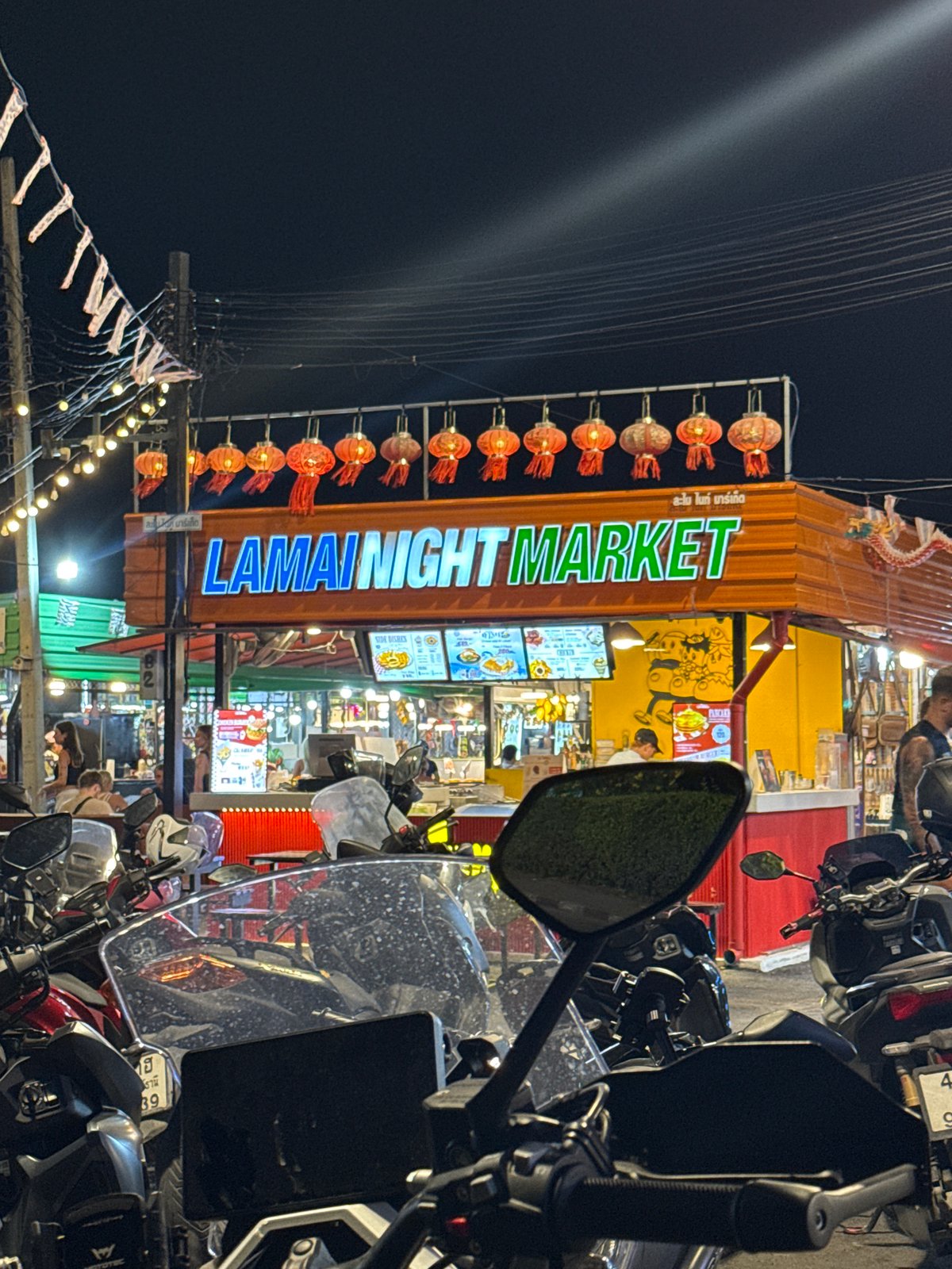 Evening scenes documented across Baan Lamai night market and restaurants
