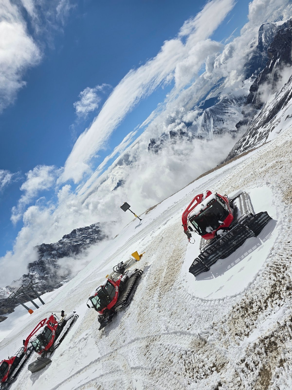 Snow groomers maintain Alpine slopes in Garmisch-Partenkirchen