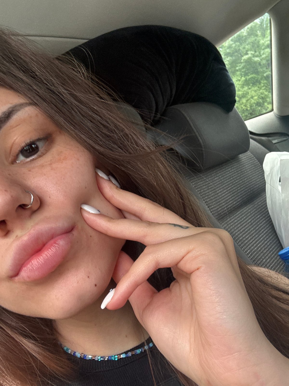 Woman Takes Selfies in Car in Sofia