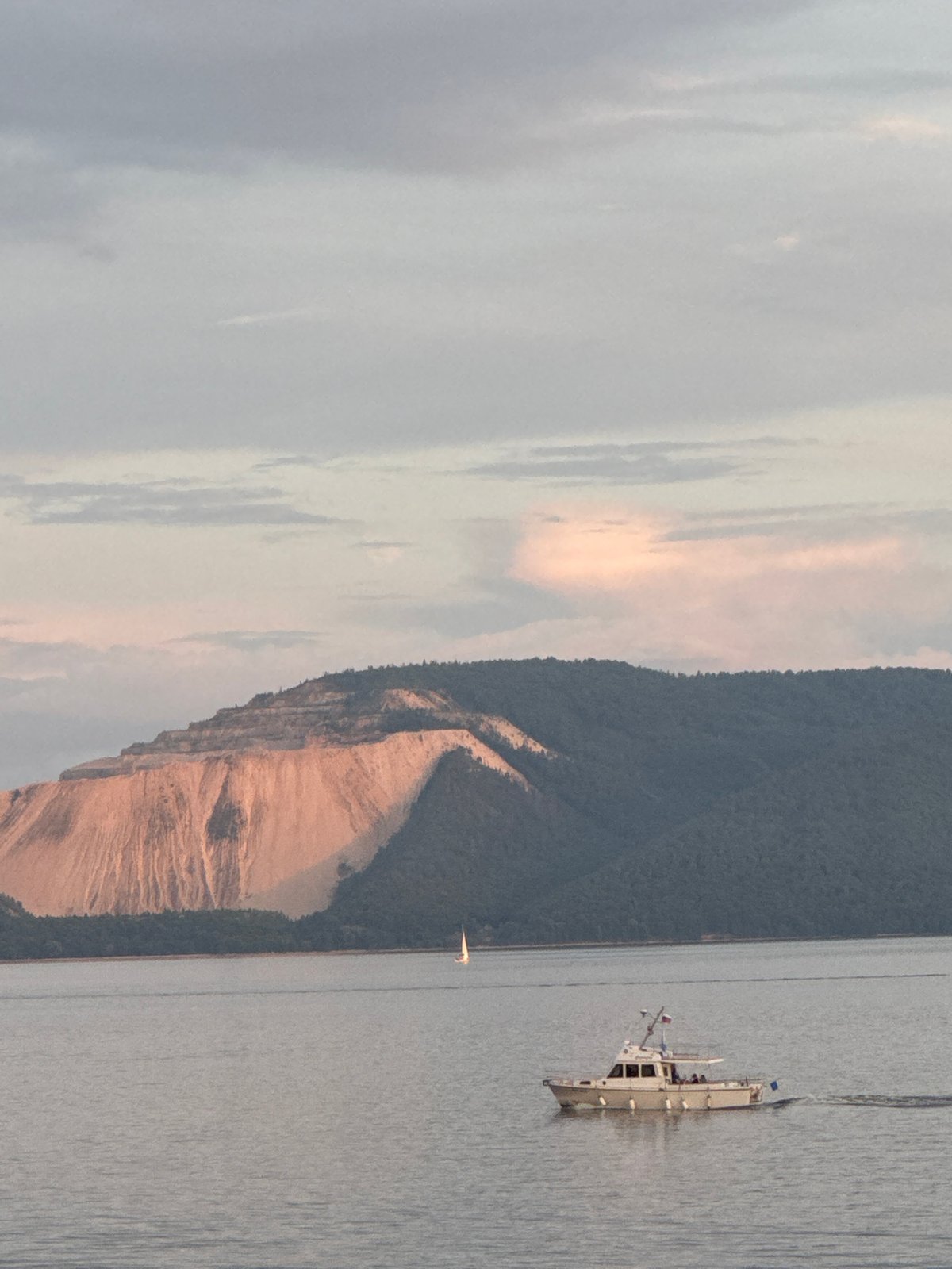 Waterfront scenes, mirror selfies, and sunset moments from June