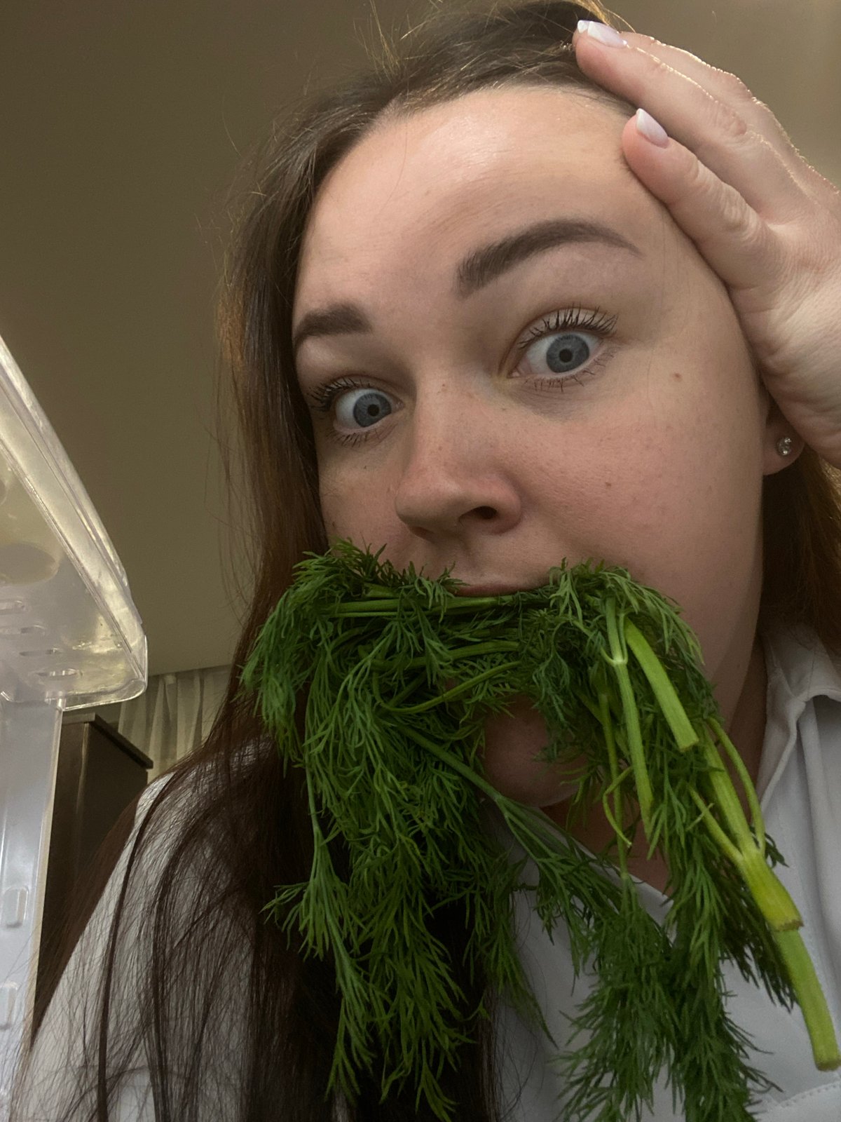 Woman poses with dill herbs in Sochi social media moment