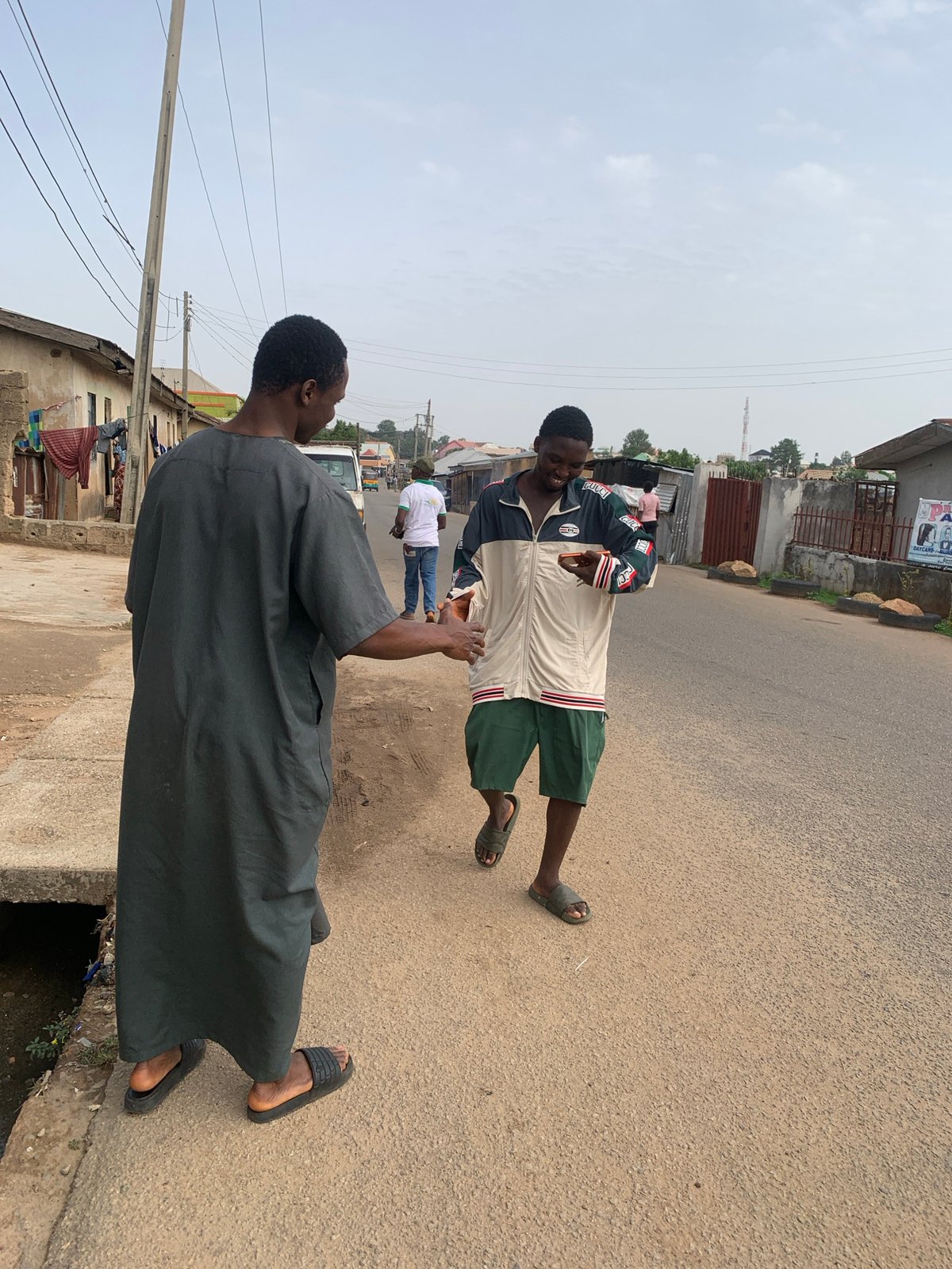 Morning street life unfolds across Jos, Nigeria neighborhoods