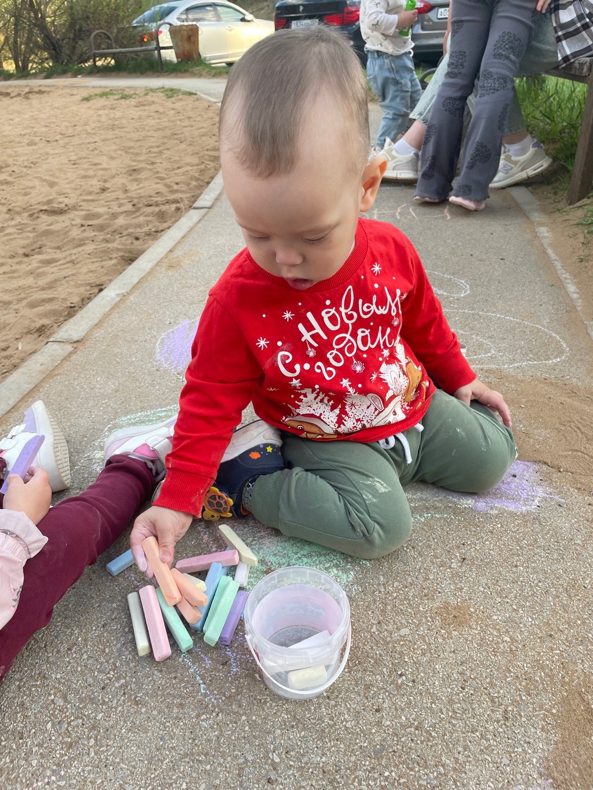 Family afternoon in Perm: children drawing, playing with gray cat