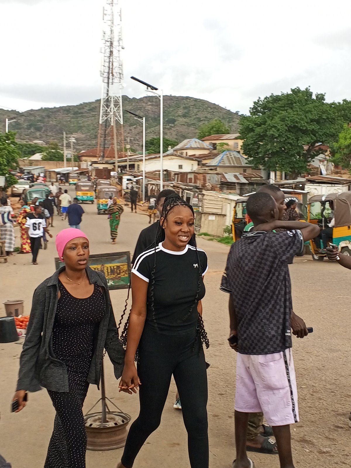 Daily life unfolds in Gwong, Nigeria amid gathering storms