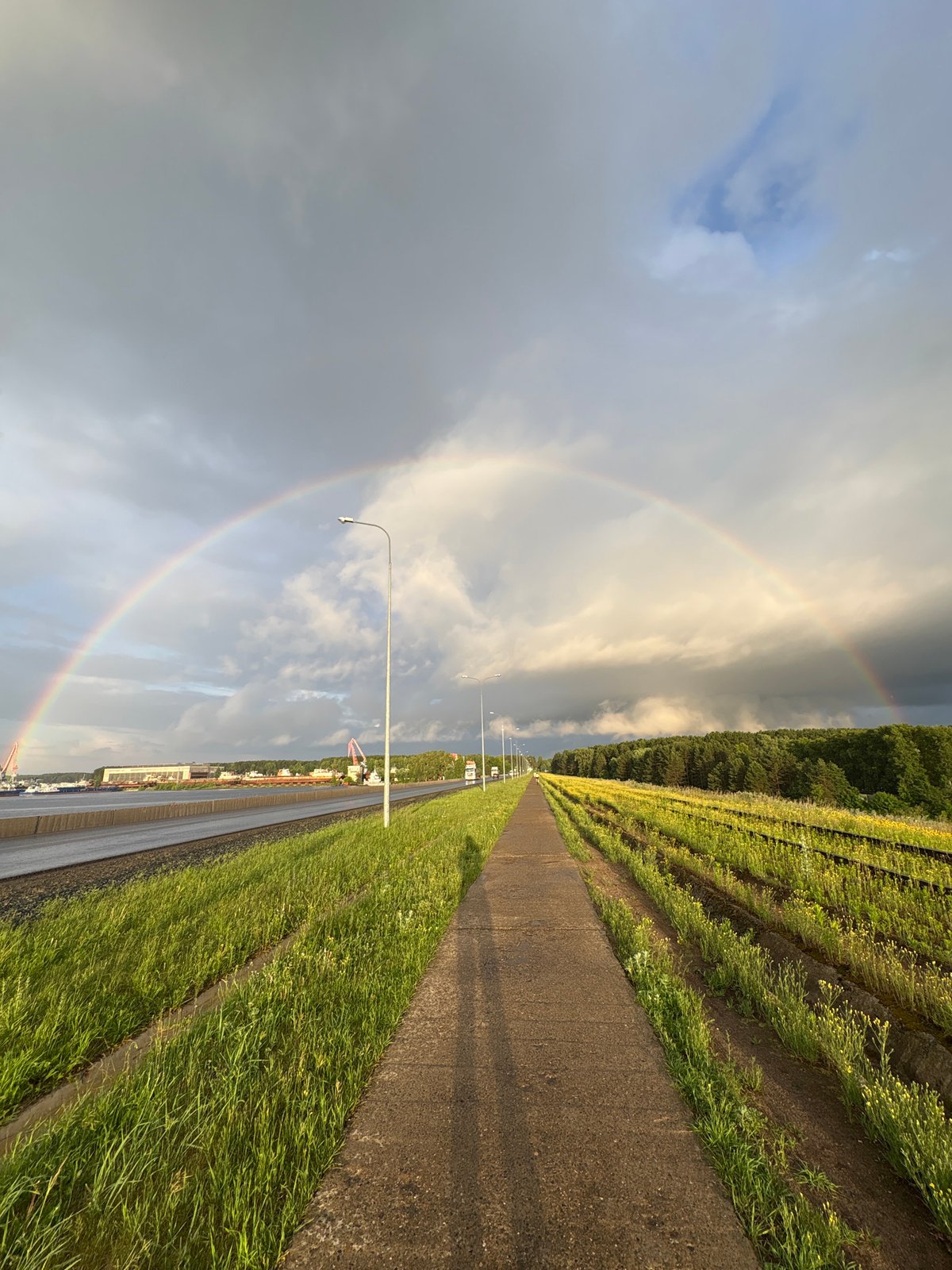 Rainbow appears over Chaikovsky harbor, captured by local residents
