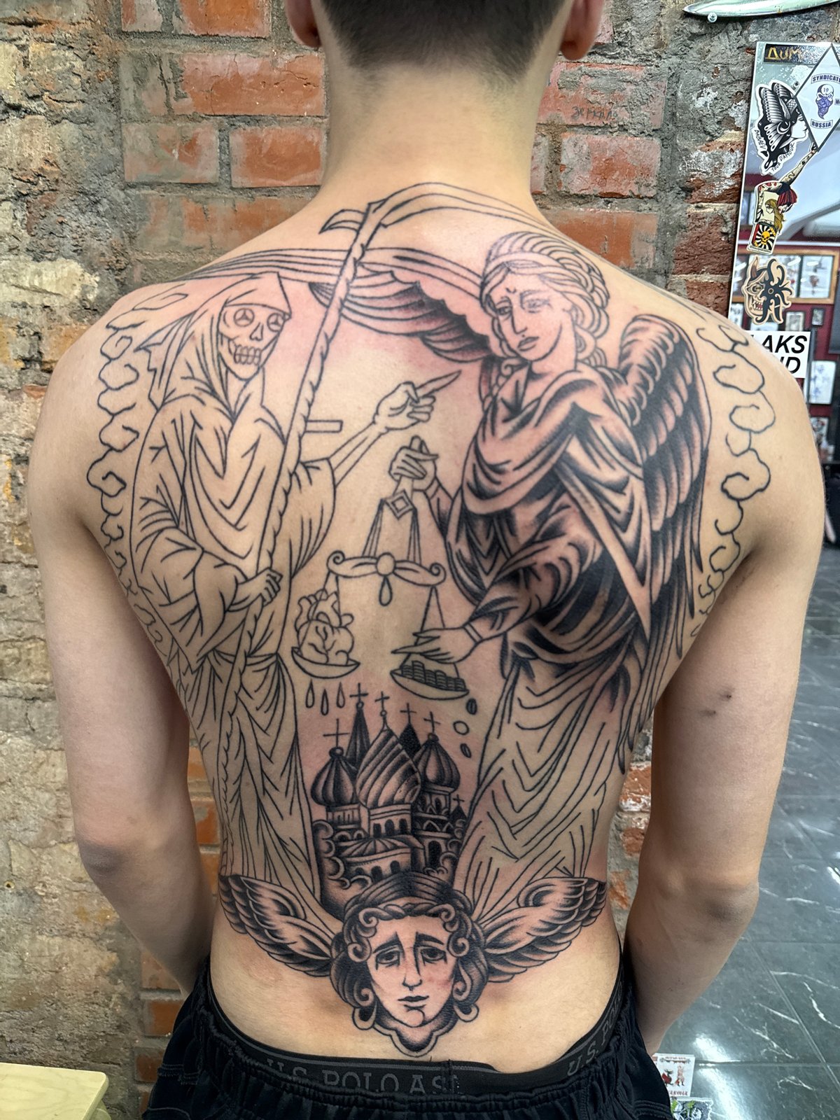 Elaborate Death-Themed Tattoo Spotted in Moscow