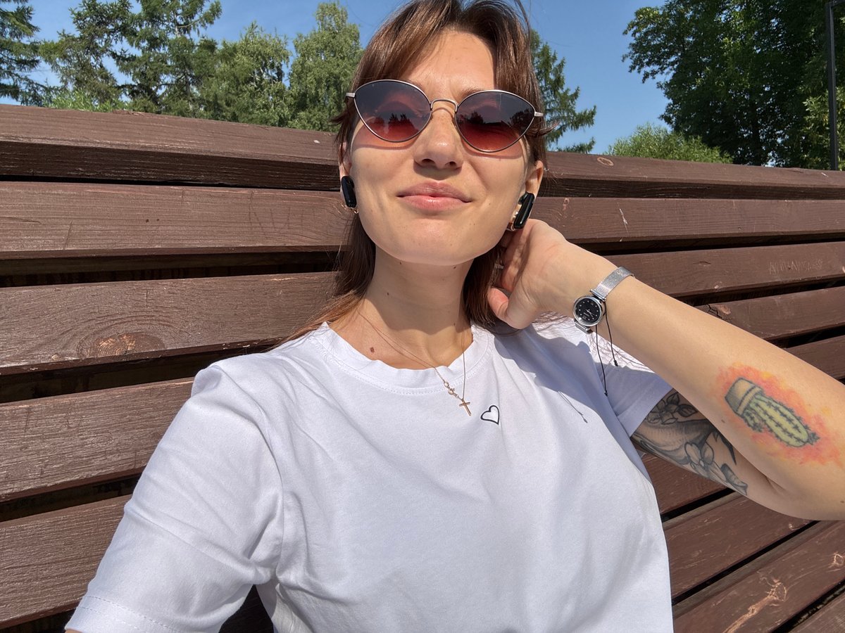 Relaxing on a bench outdoors on a sunny day in Novokuznetsk