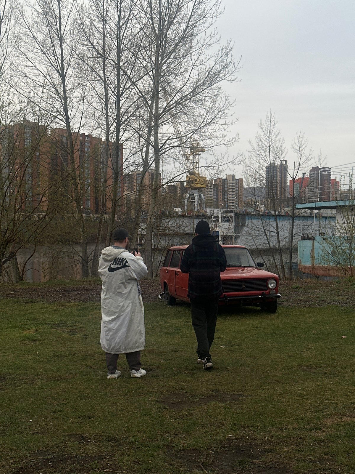 Everyday scenes documented in Krasnoyarsk featuring residents and architecture