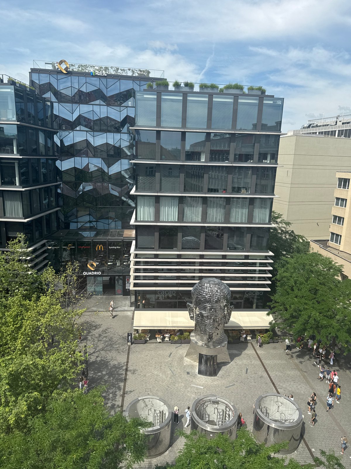 Quadrio complex plaza buzzing on a Prague morning