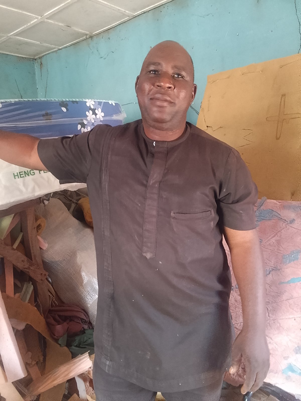 Man observed in debris-filled workshop in Pantame, Nigeria