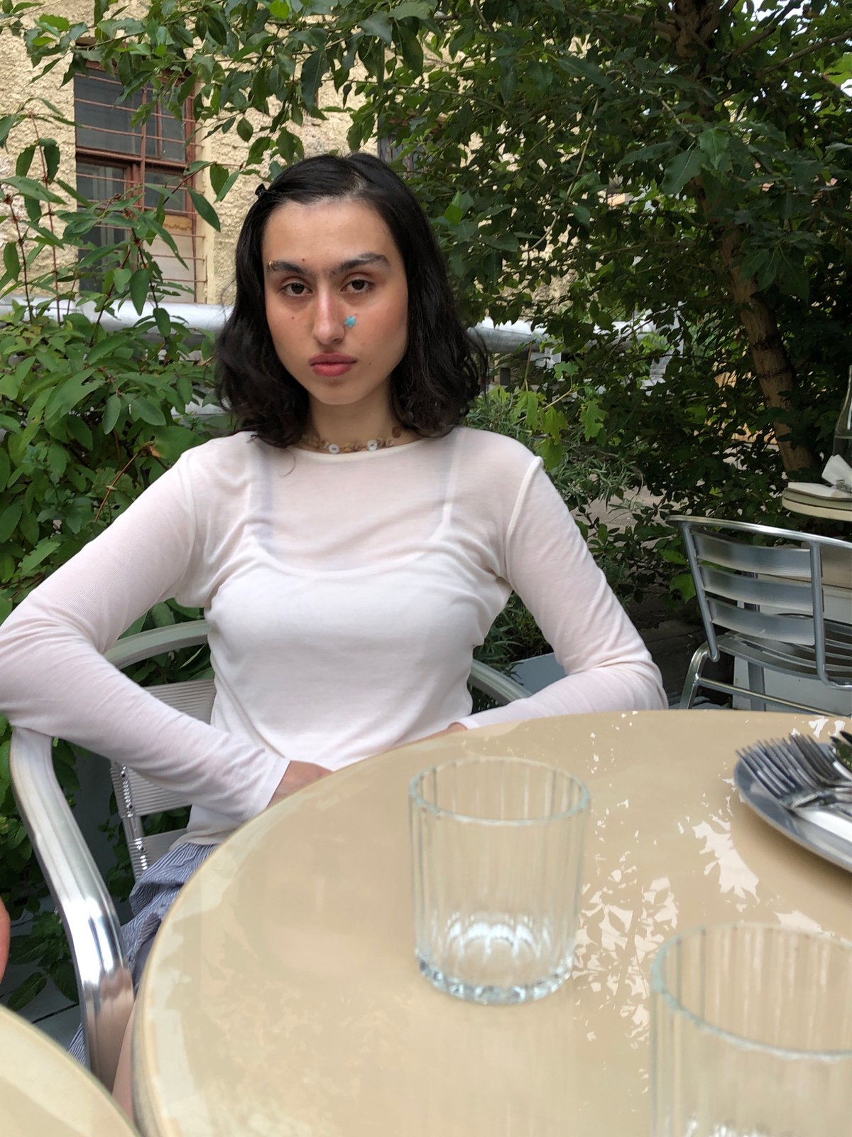 Afternoon at a Moscow outdoor café: food, drinks, and a dog