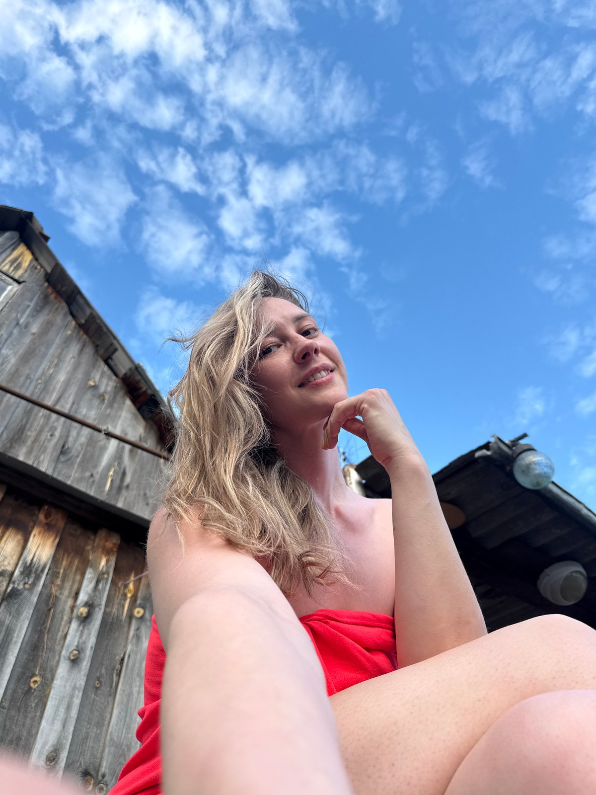 Woman documents spring day with outdoor selfies in Chaikovsky