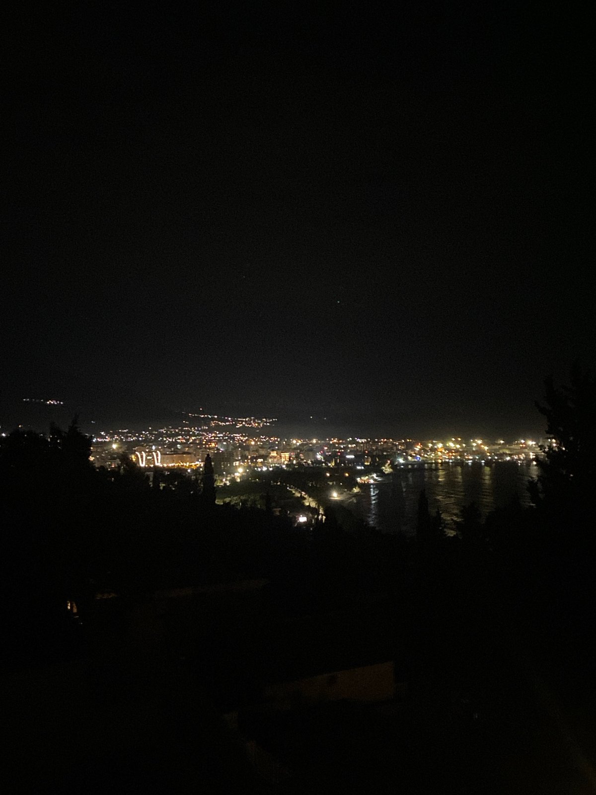 Night views captured of illuminated coastal Šušanj, Montenegro