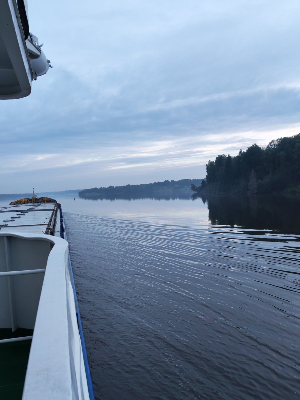 Evening ferry ride through the rivers near Kondratovo, Russia
