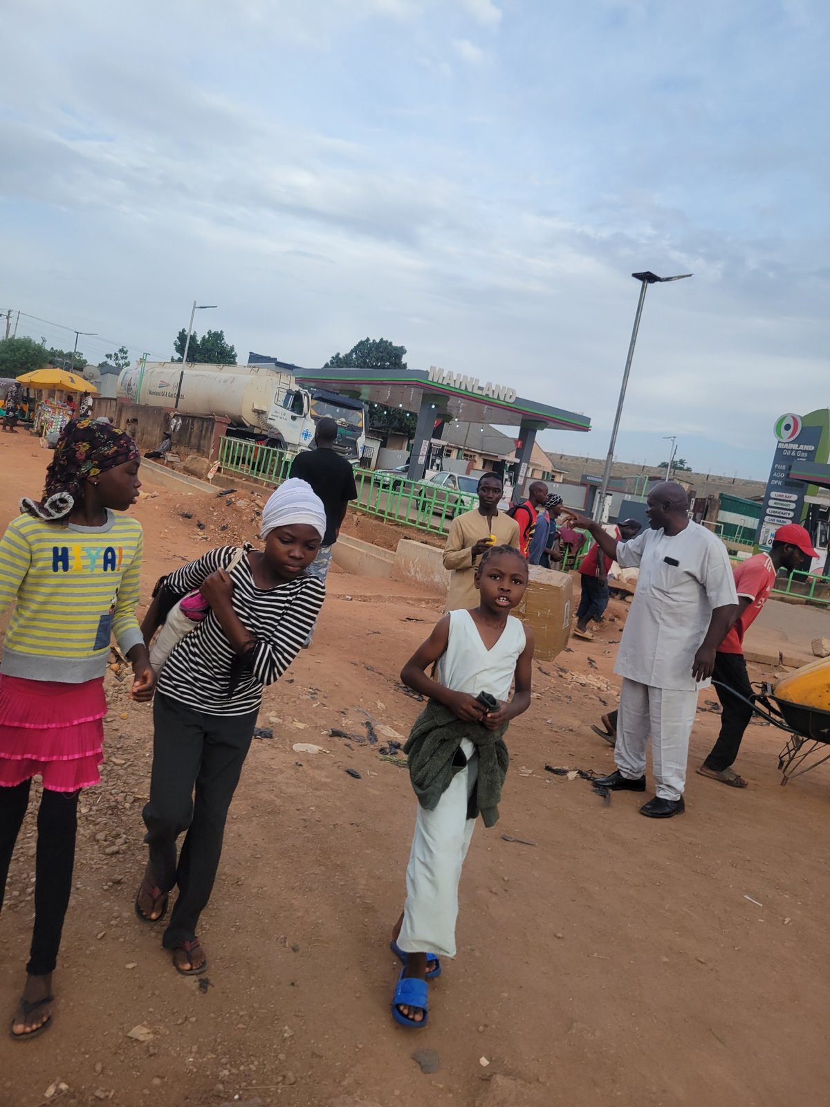 Afternoon market activity documented in Jos, Nigeria streets