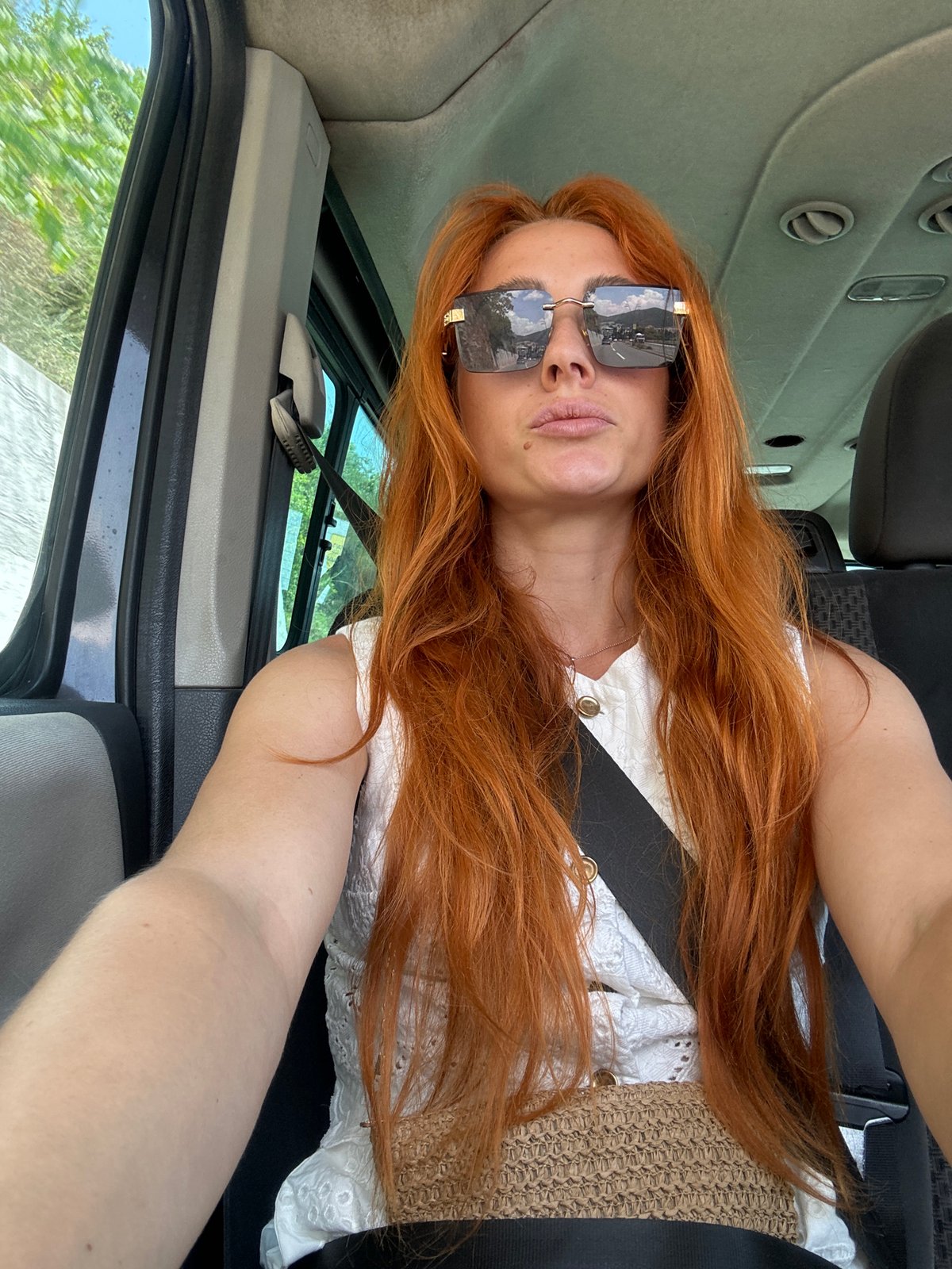 Hanging out a car window near Budva, Montenegro.