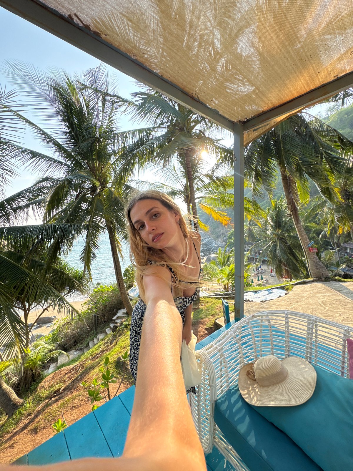 Tourist photographs at multiple Karon Beach scenic spots