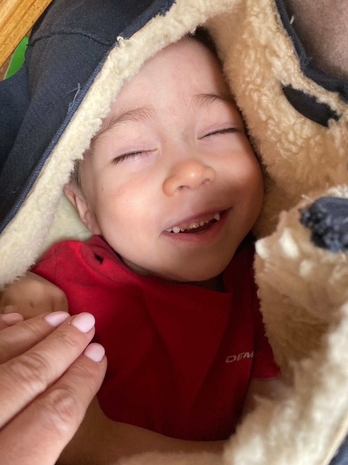 Baby photographed sleeping in carrier in Ольховка, Russia