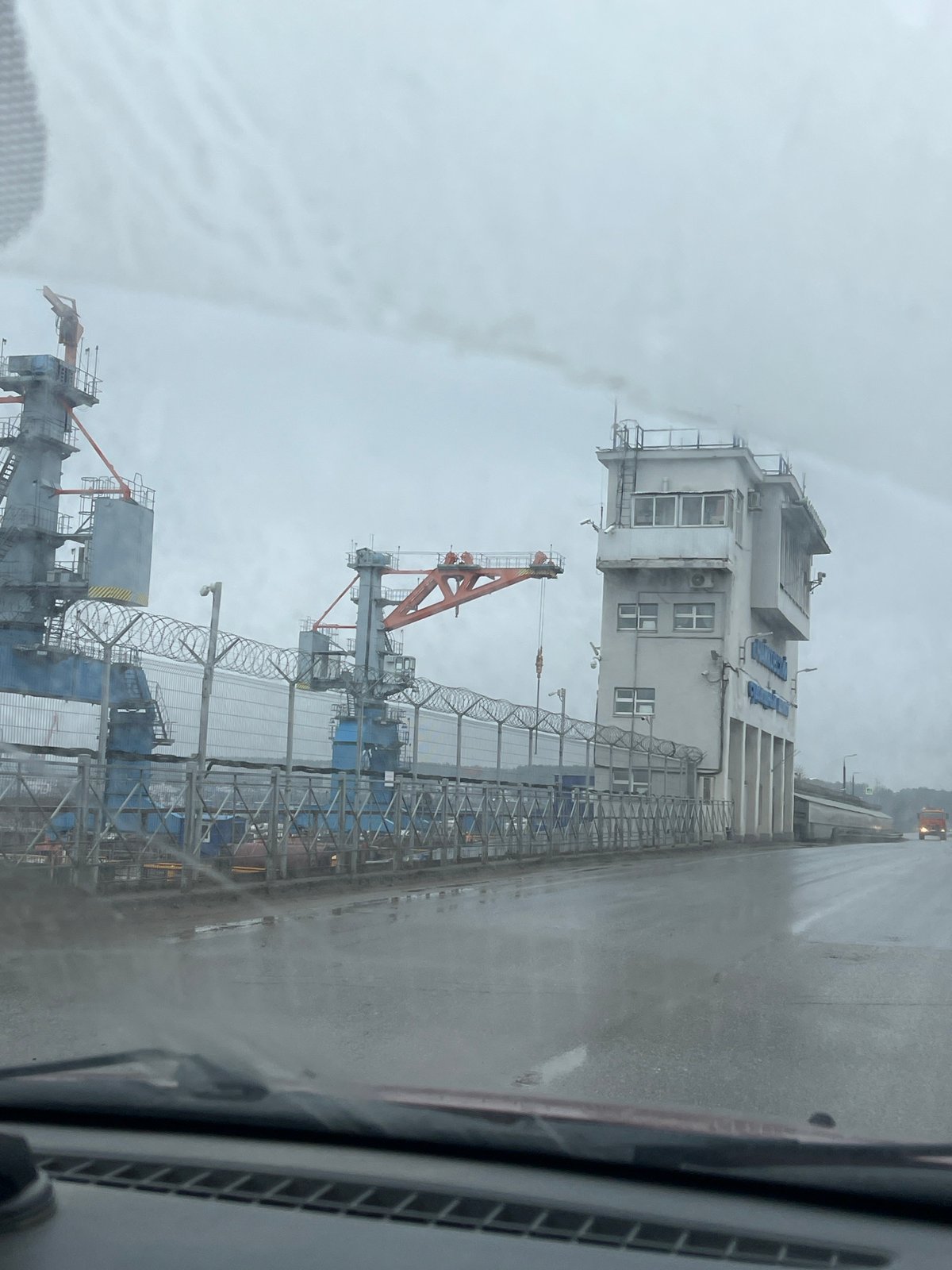 Overcast industrial view captured from vehicle in Chaikovsky, Russia