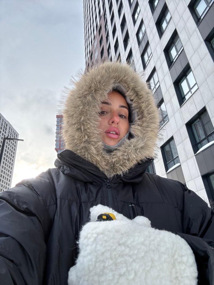 Woman takes winter selfies in Moscow cold weather