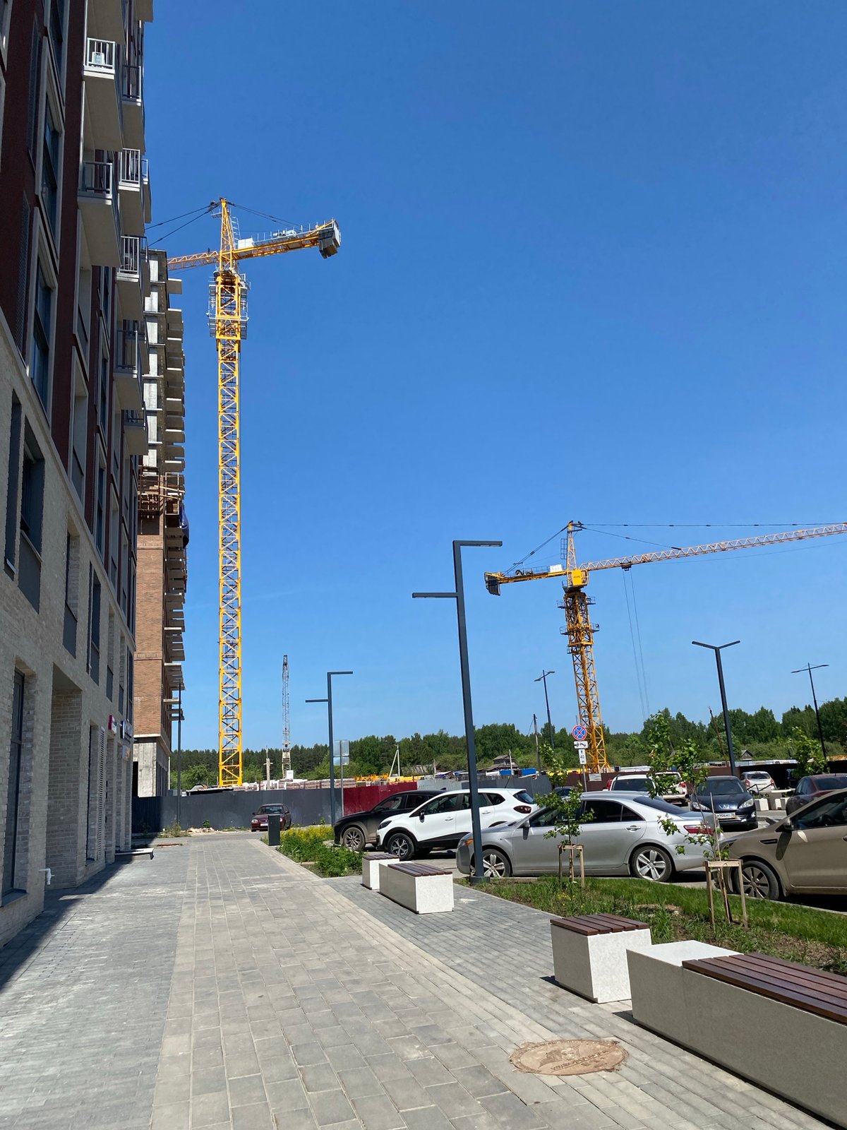 Construction activity documented in Izhevsk with yellow cranes