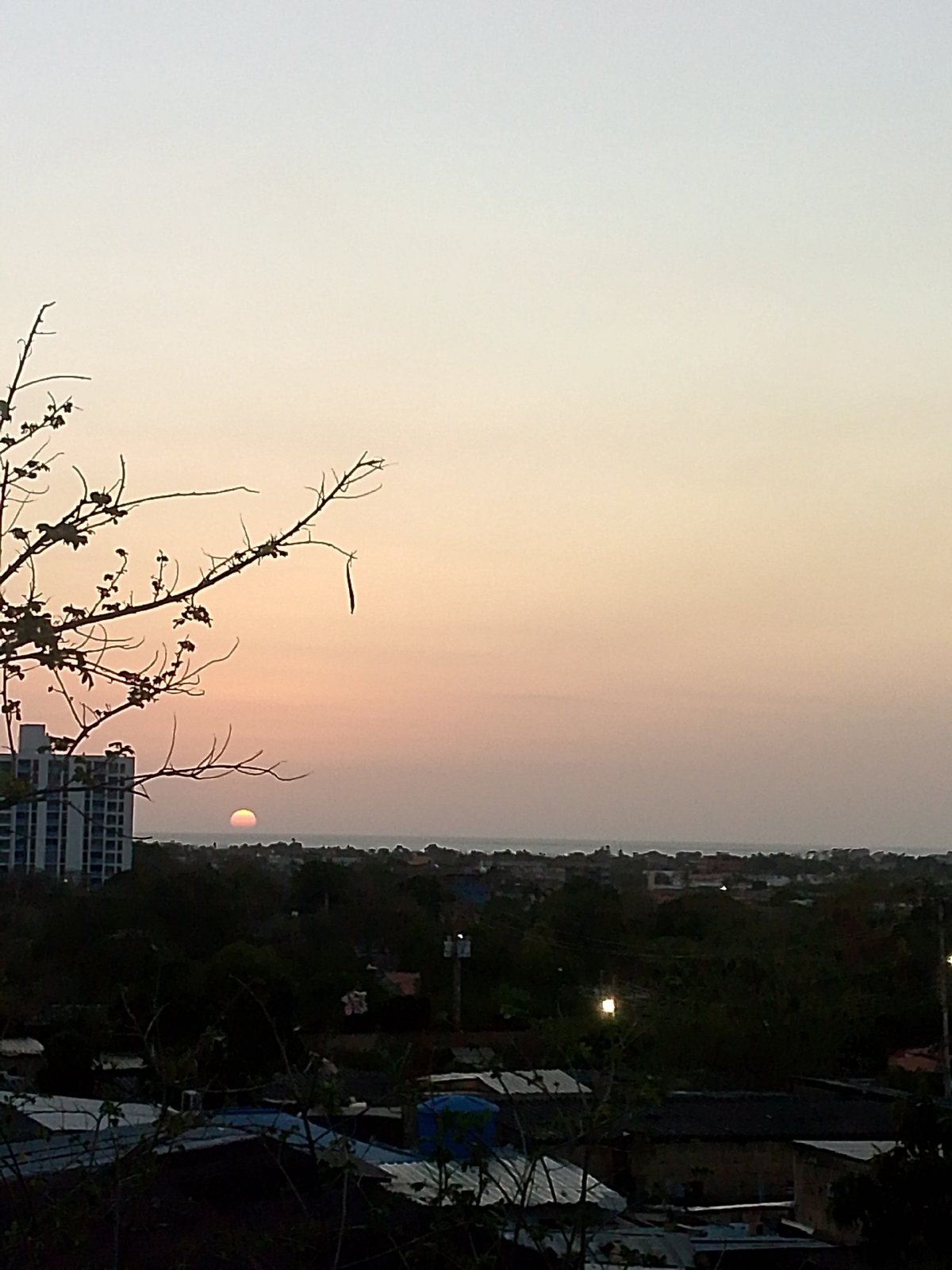 Sunset observed over Juan Griego, Venezuela residential area